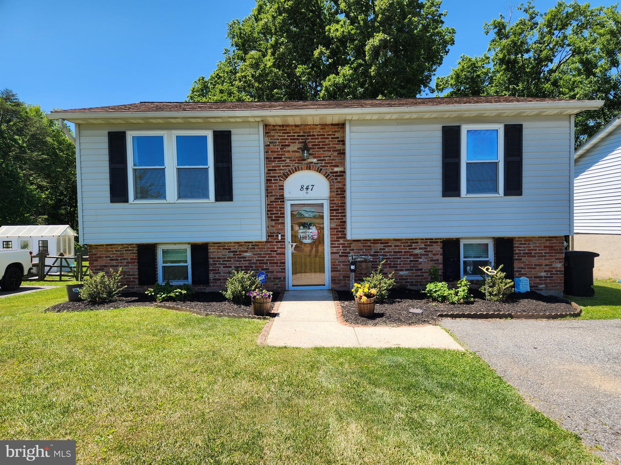 Welcome to 847 Streaker Road, where convenience, comfort, and country charm come together in one exceptional package! Perfectly positioned just minutes from downtown Sykesville, this home offers an unbeatable location with easy access to Routes 97, 70, 795, and 695 making it a true commuter's dream and giving you more time to enjoy the things that matter most.

After a busy day, unwind on the spacious back deck overlooking the fully fenced quarter-acre backyard, ideal for summer cookouts, outdoor games, gardening enthusiasts, or relaxing around the firepit under the stars. Need extra storage? The newer shed provides plenty of space for lawn equipment, tools, and seasonal items.

Inside, you'll appreciate the inviting open-concept layout designed for both everyday living and entertaining. The bright family room features a large picture window framing peaceful views of neighboring farm fields, bringing the beauty of the countryside right into your home. The generous dining area comfortably accommodates six or more guests and flows seamlessly into the family room, creating a warm and welcoming gathering space.

The heart of the home is the well-appointed kitchen, offering an abundance of cabinet and counter space that will delight any home chef. Stainless steel appliances, ample work surfaces, and plentiful storage make meal preparation and entertaining both convenient and enjoyable.

The upper level offers comfortable bedroom accommodations and a full bath, while the lower level expands your living space with a third bedroom, a second full bathroom, and a spacious recreation room. Walk-out sliding glass doors fill the lower level with natural light and provide direct access to the backyard, making this level perfect for guests, hobbies, a home office, or additional family living space.

Enjoy the best of both worlds, small-town charm, commuter convenience, scenic farm views, and outdoor living; all at 847 Streaker Road.