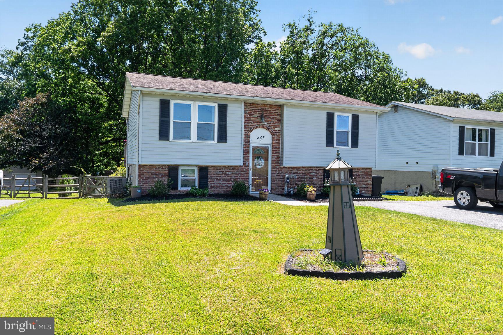 Welcome to 847 Streaker Road, where convenience, comfort, and country charm come together in one exceptional package! Perfectly positioned just minutes from downtown Sykesville, this home offers an unbeatable location with easy access to Routes 97, 70, 795, and 695 making it a true commuter's dream and giving you more time to enjoy the things that matter most.

After a busy day, unwind on the spacious back deck overlooking the fully fenced quarter-acre backyard, ideal for summer cookouts, outdoor games, gardening enthusiasts, or relaxing around the firepit under the stars. Need extra storage? The newer shed provides plenty of space for lawn equipment, tools, and seasonal items.

Inside, you'll appreciate the inviting open-concept layout designed for both everyday living and entertaining. The bright family room features a large picture window framing peaceful views of neighboring farm fields, bringing the beauty of the countryside right into your home. The generous dining area comfortably accommodates six or more guests and flows seamlessly into the family room, creating a warm and welcoming gathering space.

The heart of the home is the well-appointed kitchen, offering an abundance of cabinet and counter space that will delight any home chef. Stainless steel appliances, ample work surfaces, and plentiful storage make meal preparation and entertaining both convenient and enjoyable.

The upper level offers comfortable bedroom accommodations and a full bath, while the lower level expands your living space with a third bedroom, a second full bathroom, and a spacious recreation room. Walk-out sliding glass doors fill the lower level with natural light and provide direct access to the backyard, making this level perfect for guests, hobbies, a home office, or additional family living space.

Enjoy the best of both worlds, small-town charm, commuter convenience, scenic farm views, and outdoor living; all at 847 Streaker Road.