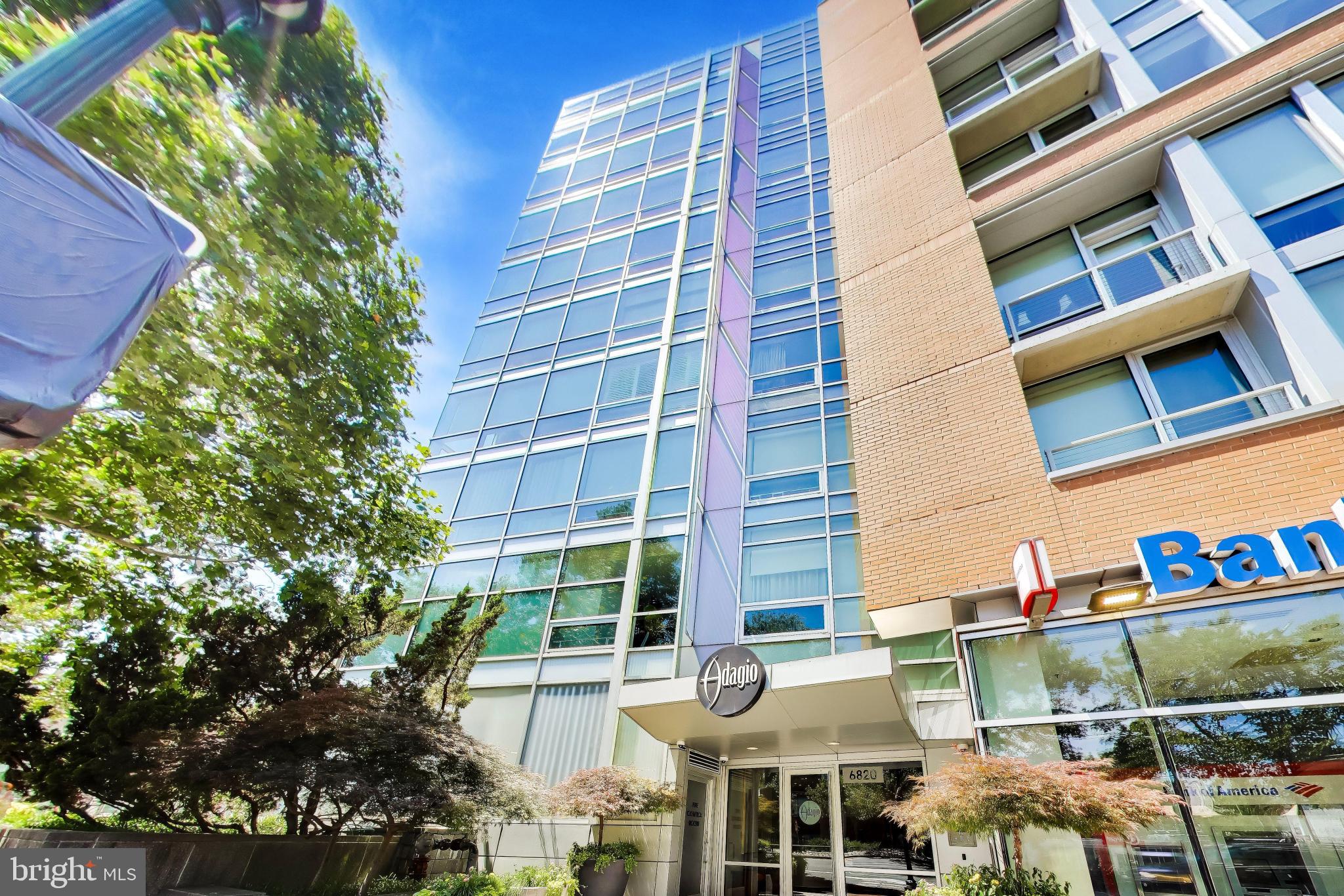 Rarely available! Spacious 1-bedroom + den, 2 full bathroom residence offering over 900 square feet of beautifully designed living space in the sought-after Adagio. Floor-to-ceiling windows, a private balcony with beautiful views, deeded garage parking, and an unbeatable downtown Bethesda location make this home truly exceptional. Natural light fills the open-concept floor plan, creating an inviting space that is perfect for both everyday living and entertaining. The well-appointed kitchen features stainless steel appliances, gas cooking, a center island with breakfast bar, ample wood cabinetry, and stone countertops.
The spacious primary suite offers floor-to-ceiling windows, a large walk-in closet, and a private en-suite bath. A rare second full bathroom and generously sized den provide exceptional flexibility, making the space ideal for a home office, guest accommodations, fitness room, library, or additional living space. Step outside onto your private balcony and enjoy beautiful views while relaxing above the heart of downtown Bethesda. A deeded garage parking space provides added convenience, while the secure luxury building offers concierge service, a fitness center, resident lounge, media room, bicycle storage, guest parking, and beautifully maintained common areas. Perfectly situated just steps from Bethesda Row, the Metro, Capital Crescent Trail, grocery stores, boutique shopping, award-winning restaurants, and endless entertainment, this home offers the ideal combination of luxury, convenience, and walkable urban living.
Experience the very best of downtown Bethesda living in one of the area's premier luxury condominium communities. Welcome home!