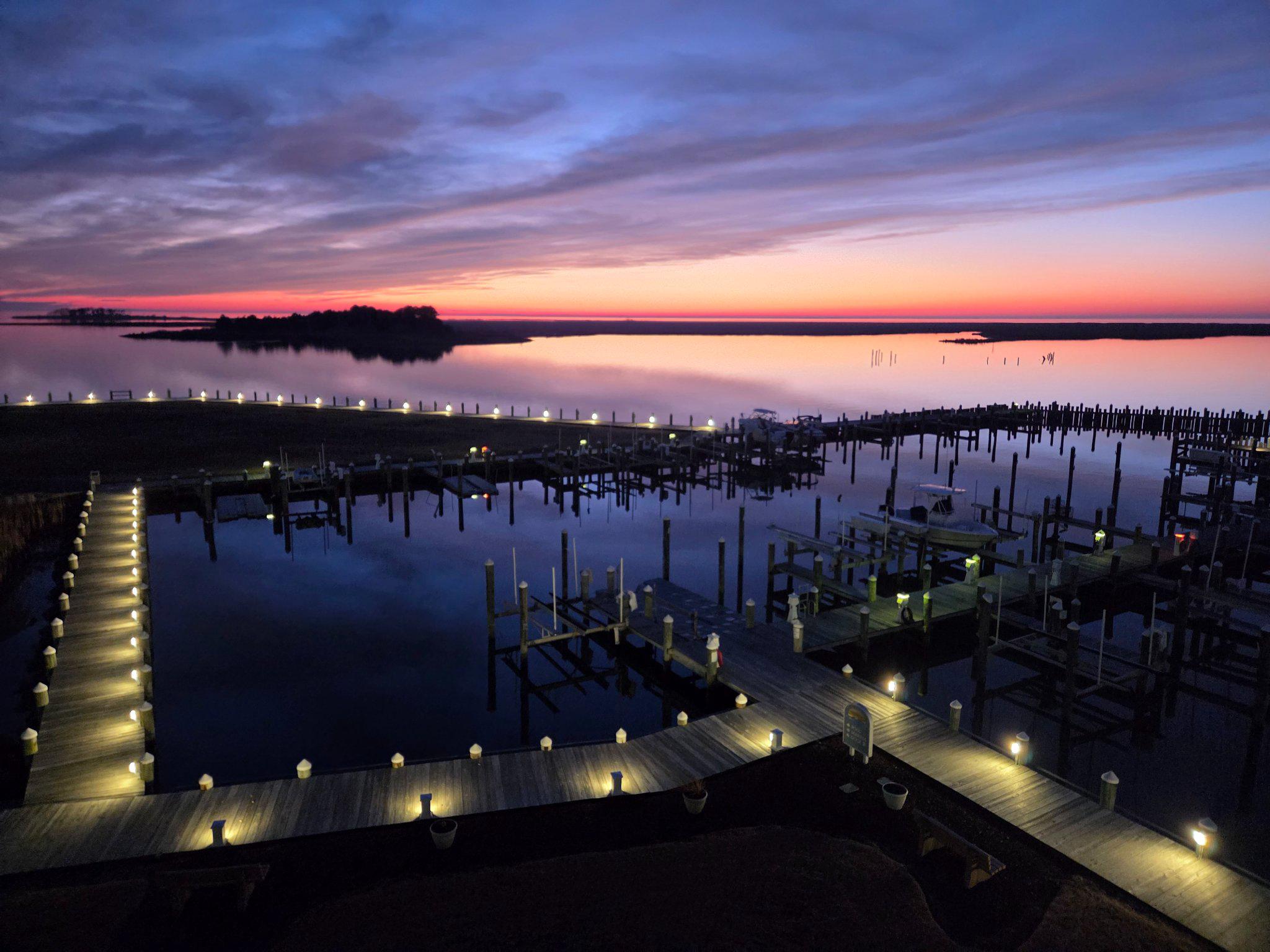 Closing help with full price offer! Eastern Shore waterfront living awaits you at Harbour Light, offering stunning views of the Tangier Sound for a fraction of the cost of most waterfront locations. This beautifully maintained home features 3 spacious bedrooms, 2 full baths, beautiful wood floors, third‑floor water views, and a 40' private deeded boat slip (D‑1)—all available immediately so you can start enjoying those unforgettable sunsets right away.

Step inside to a home that feels completely renovated, clean, and move‑in ready. The centrally located kitchen offers abundant cabinet space, pantry, pull‑out base trays—now enhanced with a new refrigerator, new stove, new sink, new dishwasher, and new backsplash. Additional upgrades include fresh paint, a renovated bathroom, new sliding glass doors, new ceiling fans, new washer and dryer, a new programmable thermostat, and remote‑controlled blinds for effortless comfort.

Enjoy beautiful water views from the living room, kitchen, primary bedroom, balcony, and screened porch. A separate laundry/utility room provides extra storage for pool gear or fishing supplies, while the exterior storage closet is perfect for tools, toys, and tackle. Elevator access, a heated community pool, and a pool house with men’s and women’s changing areas and a full bath house add exceptional convenience and comfort.

The location is exceptional—close to medical offices, with a new medical annex opening soon, plus nearby shopping and walkable restaurants and cafés that make everyday living easy and enjoyable.

Outdoor lovers will appreciate being just minutes from Janes Island State Park, Somers Cove Marina, Wellington Beach, and easy access to boating, biking, crabbing, and seasonal duck hunting.

Crisfield offers year‑round charm with beloved local events including the Soft‑Shell Festival, Freedom Fest, Tangier Sound Music Festival, and the Crab & Clam Bake. Whether you're seeking a full‑time residence, a weekend escape, or an investment opportunity—this is coastal Eastern Shore living at its finest.