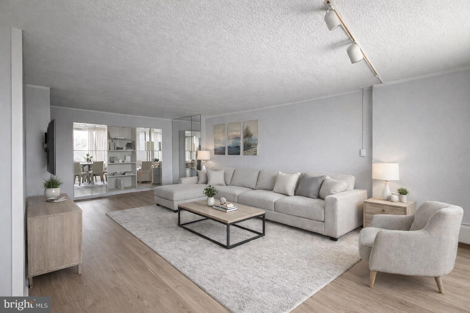 Welcome to this bright and spacious 1-bedroom, 1-bath condo located on the 10th floor, offering beautiful views and abundant natural light. This well-maintained unit features an open-concept living and dining area, a private balcony overlooking the community pool, and the convenience of in-unit washer and dryer.  A dedicated parking space is included (additional monthly fee), adding exceptional value and ease. Enjoy low-maintenance living in a prime setting with desirable amenities and elevated views. Condo fees cover all utilities (except cable), 24 hour security with gated entry, courtesy bus, tennis courts, professionally manicured grounds, library, TV and game rooms and The Green Hill Social Club are all available at THE GREEN HILL. Indoor and outdoor swimming pools and health club are also on grounds and available for a nominal fee. Conveniently located near shopping, major roads and public transportation. Two month's capital contribution due at closing. A $150 move-in fee and $500 elevator fee are charged for move-in. The $500 elevator fee is refundable if there is no damage. *photo contain virtual staging