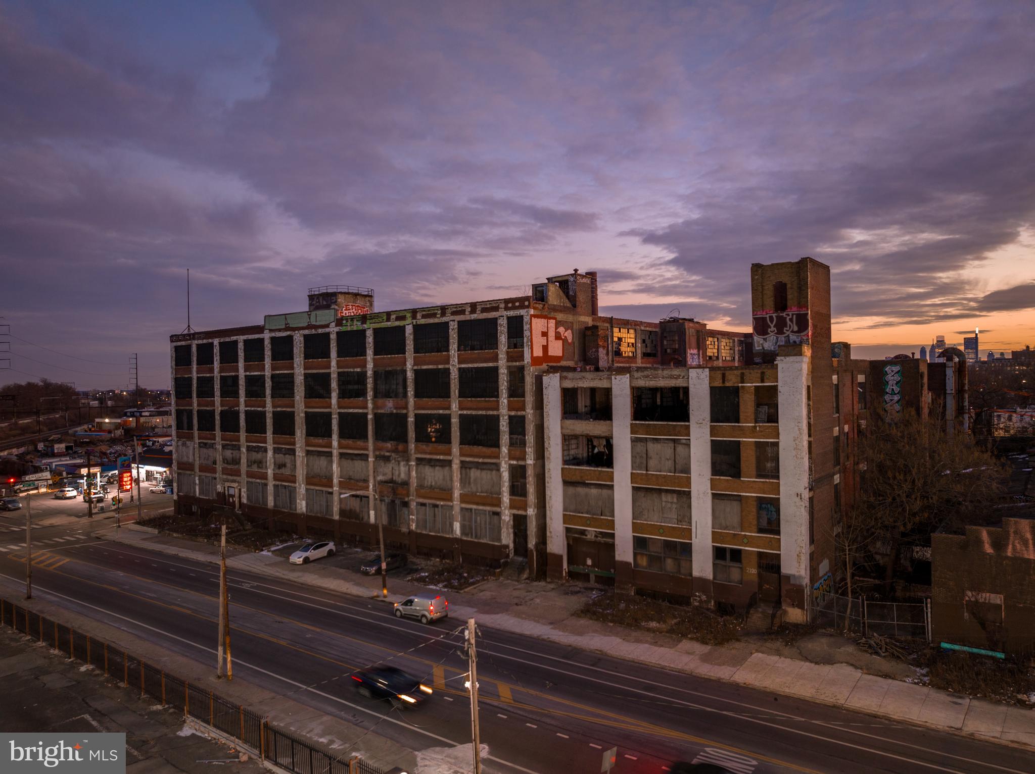The Steel Heddle Building, (the “Site” and the “Property”) is an exceptional redevelopment opportunity located at 2100 W Allegheny Ave in Philadelphia, PA. The offering presents investors with the opportunity to not only reimagine an industrial building with roots dating back to 1919, but also continue the transformation of the Nicetown-Allegheny neighborhood. 
The property  benefits from direct access to regional/local rail lines that lend easy access to the region’s employment hubs of Center City, Conshohocken and the Main Line. The proximity to the region’s thoroughfares has sparked a wave of recent investment in the submarket that puts the Steel Heddle in the path of immediate growth. Additionally, the Property is located in a Qualified Opportunity Zone and benefits from the full 10-year tax abatement, offering a rare tax advantaged opportunity for developers and investors. Currently zoned for up to 260 residential units, the Steel Heddle presents an exciting and transformational adaptive reuse project in one of the most strategically located sites in the burgeoning North Philadelphia submarket of Nicetown/Allegheny. 

SITE DETAIL 
The building is designated as a historic property and may qualify for substantial historic rehabilitation tax credits

Address 2100 W Allegheny Avenue Philadelphia, PA 19132 
Site Size (SF) 1.75 Acres | 75,600 SF 
Existing Improvement (SF) 257,000 SF 
Zoning I-1 
Tax Parcel # 884557110 

HIGHLIGHTS 

PREMIER INFILL ADAPTIVE REUSE OPPORTUNITY conveniently located only minutes away from East Falls, Fairmount Park, Center City and the Main Line. 

MAJOR EMPLOYMENT DRIVERS located within minutes of the Property. 

Situated in a QUALIFIED FEDERAL OPPORTUNITY ZONE and benefitting from the 10-YEAR TAX ABATEMENT, affording a new owner eligibility for the benefits and tax incentives that a QOZ provides. 

Robust fundamentals and market resiliency fuel LONG TERM GROWTH, as the City of Philadelphia has fared better than most major metros after an economic downturn. 

UNMATCHED ACCESSIBILITY to public transit (Allegheny station directly across the street) and major roadways including I-76, Route 1 and I-676 via Broad Street (Route 611).