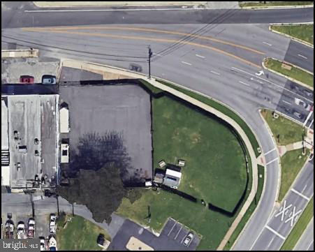 List price to be opening bid at online only auction.  Online auction to be conducted on Auctioneers website. Bidding will begin on Wednesday, April 23rd & ends Monday, April 28, 2025 at 1:00PM.  For Auction: a potential Business Roadside development opportunity consisting of three adjacent, unimproved lots totaling approximately 0.366 acres in the Dundalk area of Baltimore County. These lots are to be sold together as a single package. Situated on a high-traffic corner of Merritt Blvd. and Merritt Ave., the property includes: • Lots 8 & 9: 0.239 acres / 10,398 sq. ft. • Lot 7: 0.28 acres / 5,576 sq. ft.
• Total: 0.366+/- acres. Zoning: Business Roadside (BR), the most flexible commercial classification according to Baltimore County Zoning Classifications. (Per the Baltimore County Zoning Classifications). 
Location: The property enjoys a prime spot with easy access to dining, shopping, schools, recreational amenities, and major transportation routes. Nearby attractions include CCBC Dundalk, the Dundalk Historic District, Dundalk Marine Terminal, Sparrows Point Country Club, marinas, Bear Creek Park, and Bear Creek Waterway. I-695 is just a short drive away. Note: This description is provided for informational purposes only. We strongly recommend conducting thorough due diligence prior to submitting a bid. Pictures from Google Earth.