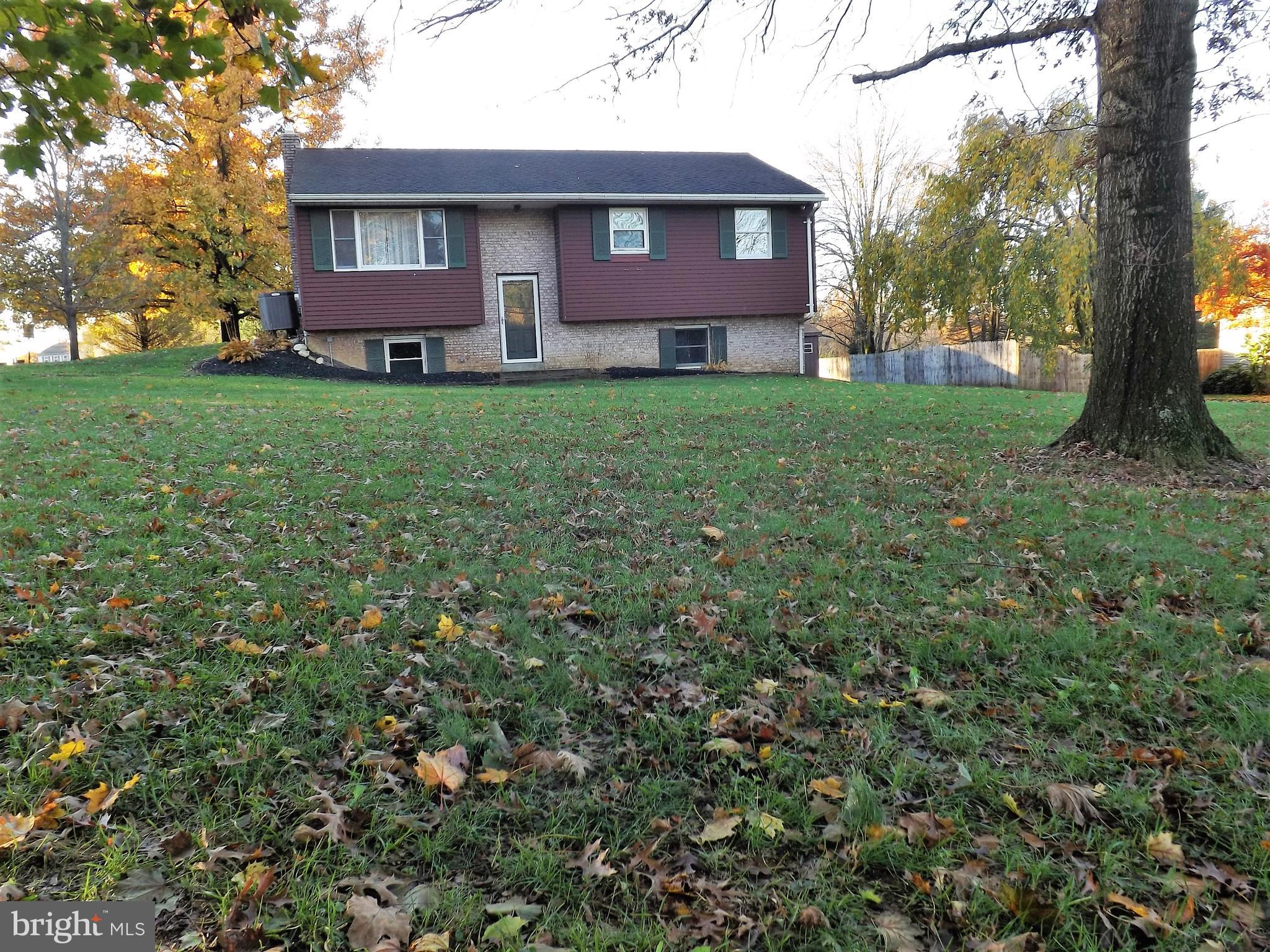 You won't find a better place for morning coffee then on this rear deck overlooking the farmland or in the winter snuggled by the wood burning firplace in the cozy Family Room.  Come see the recently remodeled bathroom, the custom masterbedroom walk in closet, newer flooring throughout, and a great detatched workshop with 220V electric for all of your tinkering needs.