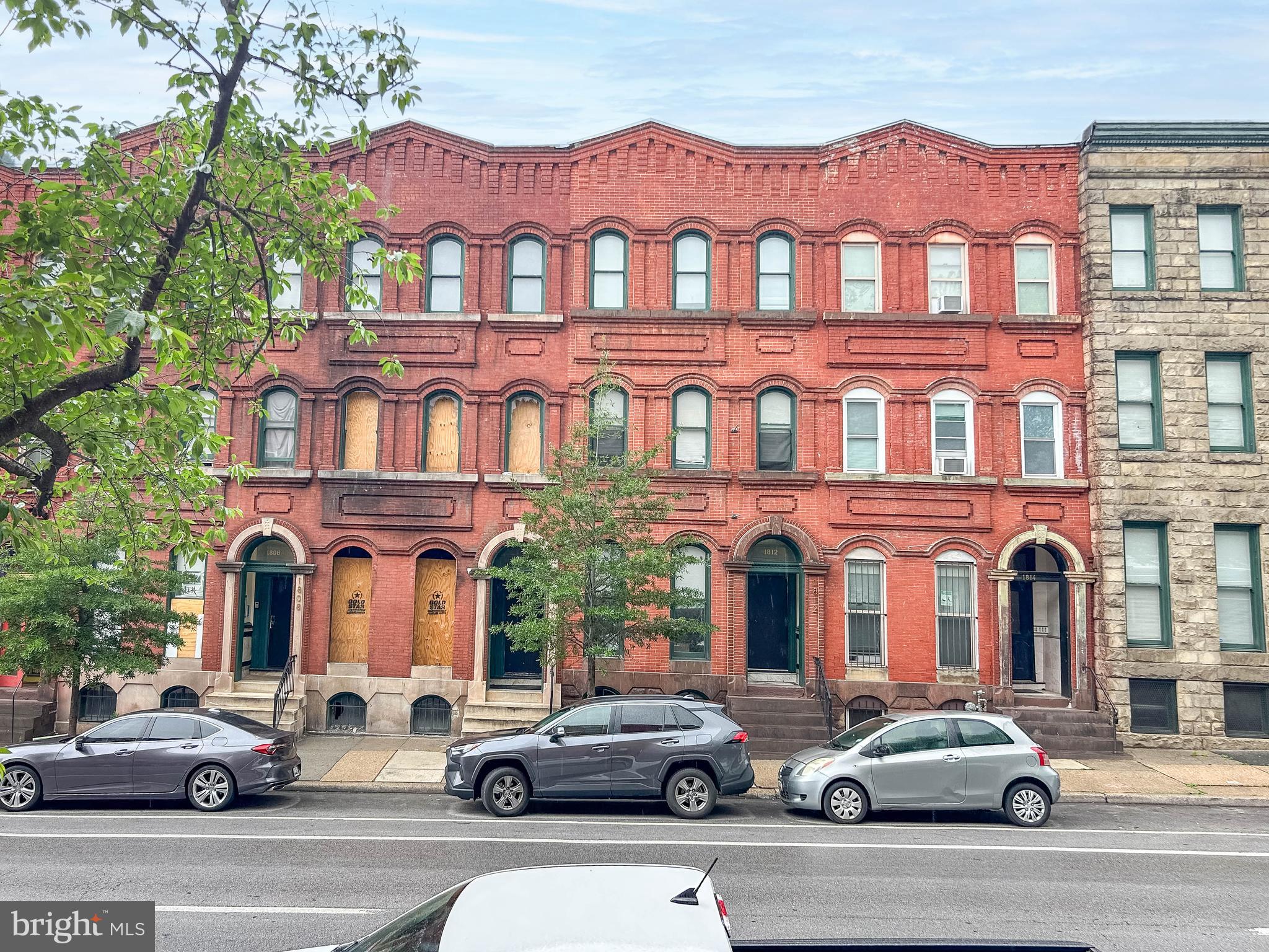 List price is opening bid. Online Auction Only! Bidding begins Friday, June 12th, and ends Wednesday, June 17, 2026 at 1:00 PM. 1808-1810-1812 Saint Paul St. (a/k/a 1808 Saint Paul St.)  Presents a rare opportunity to acquire a substantial multifamily investment property in Baltimore’s Charles North neighborhood. The property is currently configured as three connected center-unit buildings comprising a total of 12 residential units and approximately 9,135± above-grade square feet per SDAT records.
Each building consists of 3 stories plus a lower level, with 1 unit located on each level. Units are separately metered, and tenants are charged an additional $65/month toward water expenses.
1808 Saint Paul St. (4 Units)
-Unit 001: Studio- Vacant
-Unit 101: 1bd/1ba- Vacant
-Unit 202: 1bd/1ba- Vacant
-Unit 301: 1bd/1ba- Rented for $1,174/mo
*The building has sustained some fire damage.
1810 Saint Paul St. (4 Units)
-Unit 001: 1bd/1ba- Vacant
-Unit 101: 1bd/1ba- Vacant
-Unit 202: 1bd/1ba- Vacant
-Unit 301: 1bd/1ba- Vacant
*The building has sustained fire damage and is currently fully gutted.
1812 Saint Paul St. (4 Units)
-Unit 001: Studio- Rented for $916/mo (per seller)
-Unit 101: 1bd/1ba- Rented for $1,195/mo
-Unit 202: 1bd/1ba- Vacant 
-Unit 301: 1bd/1ba- Vacant Per Seller projected market rents:
1-bedroom units: approximately $1,150-$1,200/month
Studio units: approximately $950-$1,000/month
Projected gross rental income is approximately $13,400/month or $160,800 annually, please note projected figures are based on full building occupancy and projected market rents provided by seller. 
 Property is located within the OR Office-Residential zoning district, which is intended to accommodate a mix of residential, and office uses while maintaining compatibility with surrounding residential character. Permitted uses may include multifamily dwellings, offices, cultural facilities, places of worship, healthcare clinics, and certain conditional commercial uses, subject to Baltimore City zoning regulations and approvals. Buyer to verify zoning and permitted uses. Note: The information contained herein has been obtained from sources believed to be reliable but is provided for informational purposes only. Neither the auctioneer, cooperating agent, nor the owner makes any representations or warranties as to the accuracy or completeness of the information.