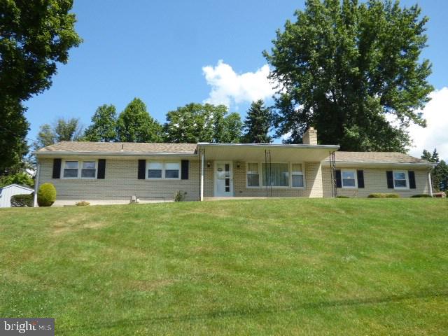 Well-maintained 3BR, 2BA solid brick rancher, with end-load 2-car garage. Central Schools! Minutes to I83, Rt30, and conveniences. Covered front porch and covered rear patio, shed. Updated kitchen with appliances, living rm with fireplace, partially finished lower level had family/game rm and 2nd fireplace. Mostly replacement windows and updated electric coming!