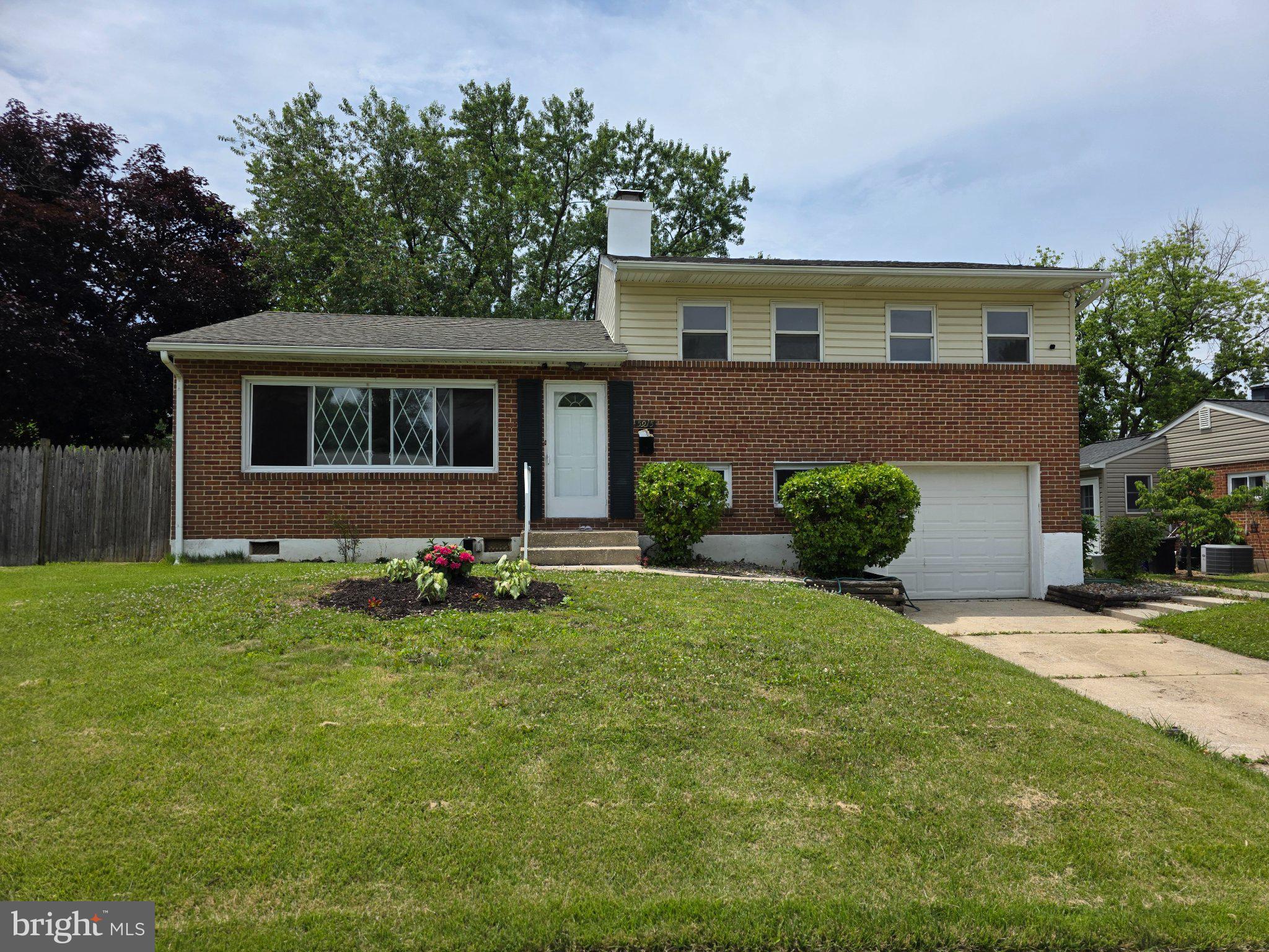 Nestled in the charming Westview Park neighborhood, this delightful split-level home offers a perfect blend of comfort and functionality. Built in 1955, its classic brick front exudes timeless appeal. Inside, you'll find new paint throughout and all hardwood/composite floors. Three spacious bedrooms and two full bathrooms, ideal for relaxation and privacy. The heart of the home features a well-appointed kitchen with stainless steel appliances, including a built-in microwave, dishwasher, and gas oven/range, making meal prep a joy. The daylight basement provides additional living space, perfect for a cozy family room or a home office. An attic/house fan ensures year-round comfort, while the attached garage offers convenience and easy access. Outside, the 0.16-acre lot provides a lovely setting for outdoor activities. Located near local parks, shopping, and dining, this home is a true gem in a vibrant community. Experience the warmth and charm of Westview Park-your new sanctuary awaits!