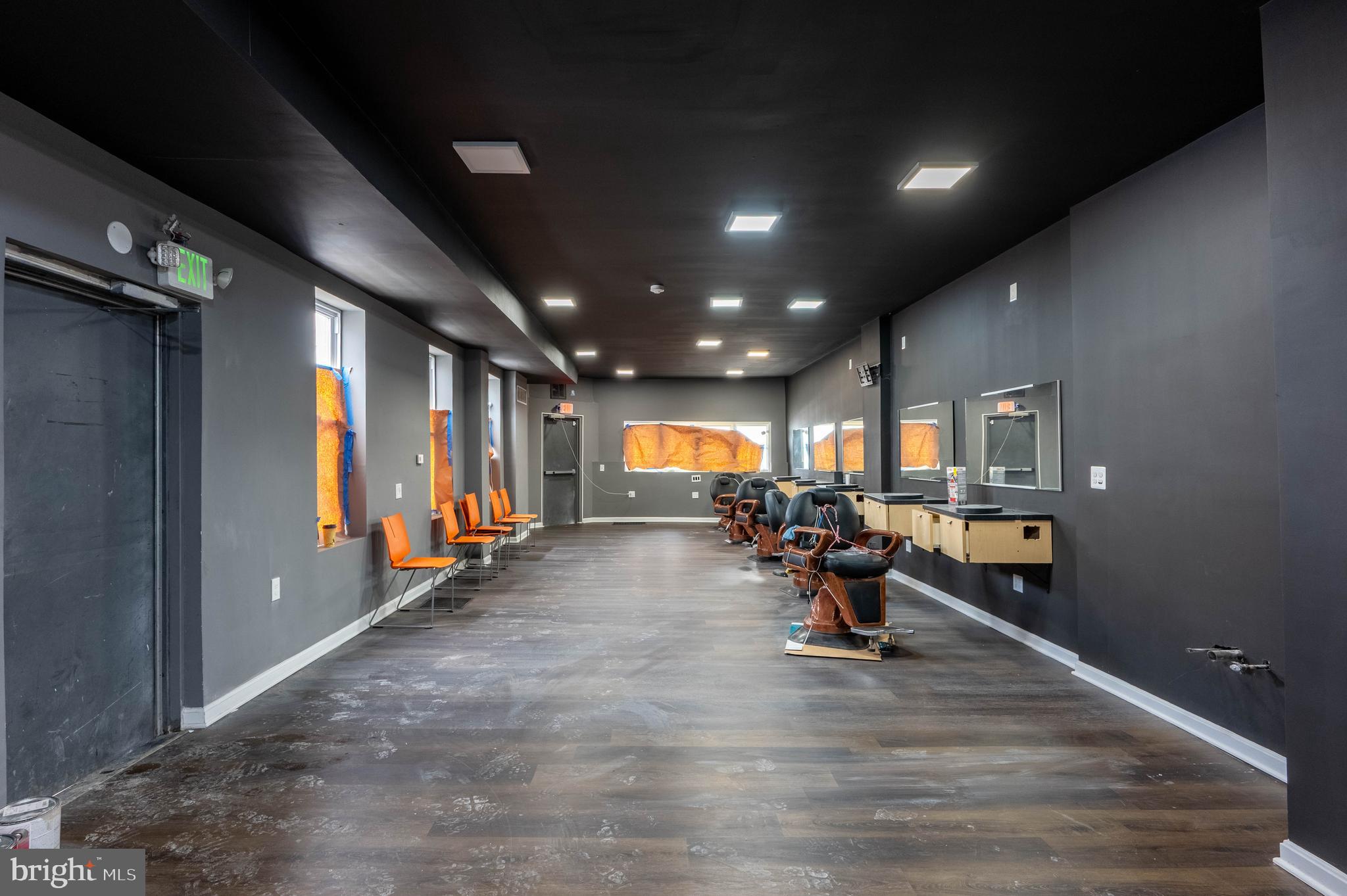 Wow Look at this mix used Property Currently is set up as a Barber Shop and Three rental units and a studio Unit, Updates Galore Freshley Painted throughout, Brand New Floors, Appliances Bathrooms Way too much to list, This will not last!!