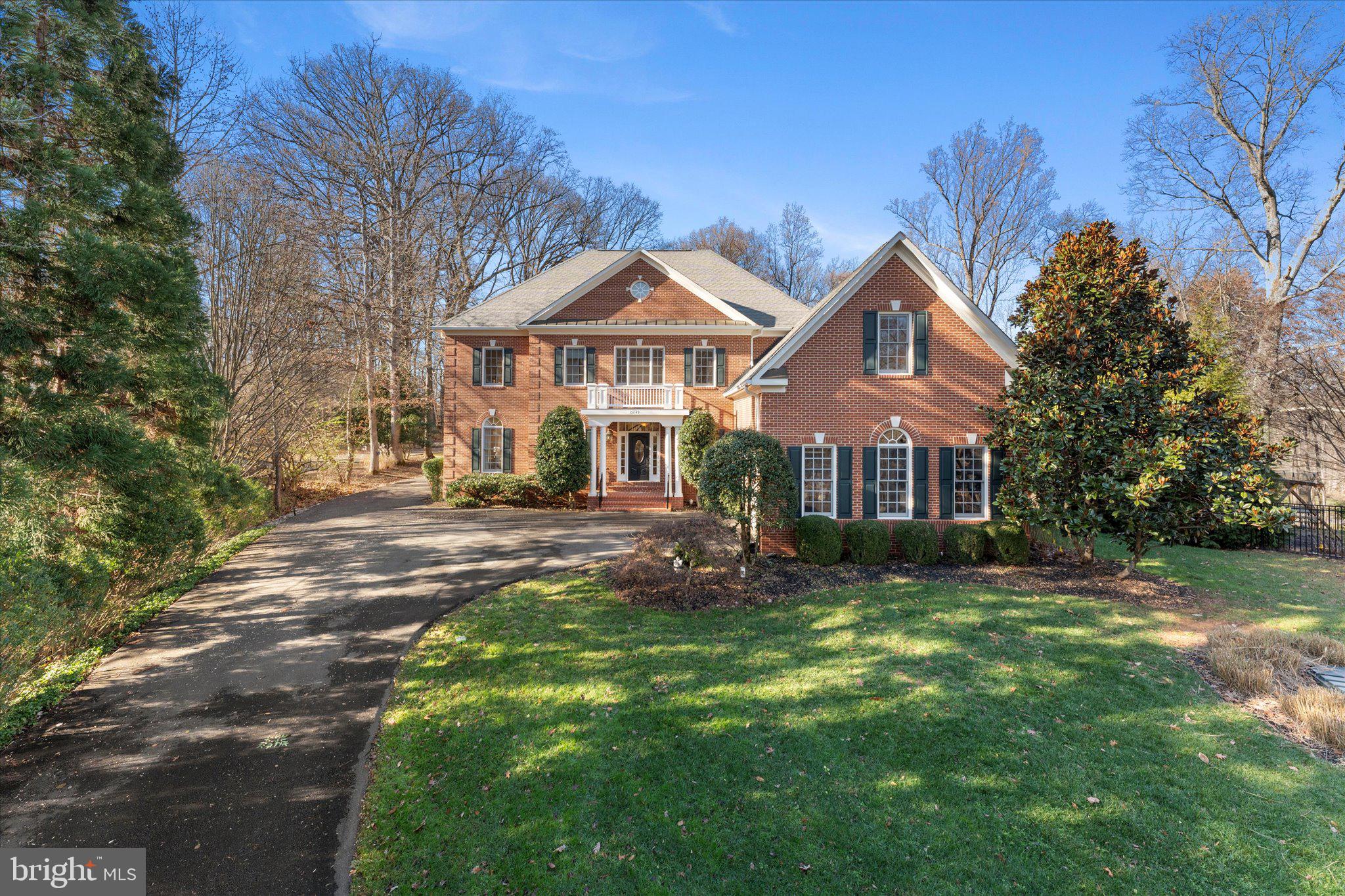 Welcome to this Exceptional Masterpiece of Quality and Luxury, situated on a serene 1.2-acre lot. This home exudes elegance from the moment you approach, with a beautiful brick stoop, portico entrance and beautiful beveled glass front door. The grand two-story foyer showcases a stunning curved staircase, complemented by soaring 10-foot ceilings exquisite moldings and hardwood flooring throughout the main level. 

Entertain in style with the formal dining room and living room, both perfect for hosting guests. The spacious gourmet kitchen features a large island, a coffee/wine bar with a wine refrigerator, a walk-in  pantry with an additional refrigerator, two dishwashers, double ovens, two sinks, and a hidden pop-up step stool.
The expansive family room boasts a fabulous stone fireplace, and a wall of glass doors leading to a large screened-in porch with a door to additional deck for grilling, both have view of spacious tree lined private back yard 
The main level includes a well-appointed bedroom with double doors and an extra wide doorway to an ensuite bathroom, offering privacy and comfort, this room could also be used as a main floor study/office. An elevator services all three floors of the home, providing convenience and accessibility. The main level also features a large laundry room with extensive cabinetry, a utility sink, a mudroom closet with cubbies,  a built-in desk, and doors leading to a fantastic covered porch with brick floor.  You will also find a back staircase, located between the laundry room and family room, leading to the upper level. The main level also includes a full bath with access to the garage and deck perfect for entertaining.

On the upper floor, the expansive primary bedroom is accessed through double doors and boasts a coffered ceiling, a private sitting room, and a large custom walk-in closet with a dressing area. The luxurious ensuite bath offers abundant cabinetry and a double-door linen closet. There are five additional generously sized bedrooms, including bedroom 6 with half bath, this room is currently used as an office. Two other bedroom sets are connected by shared “buddy” baths. The upper level also features a fantastic sitting area, complete with built-in bookcases, two desk areas, and space for a sofa—ideal for relaxing or completing homework. Plus an additional full laundry room with built-ins and sink.

The second curved staircase off the foyer leads to the lower level, which includes a spacious recreation room with a gorgeous stone fireplace with gas line and large hearth, a custom bar, and a walkout to the backyard. Additional features include an exercise room, a theater room with Bose surround sound, a Zen/craft room, and a guest room with a full bath.

The property has a private driveway connecting to a back shared driveway making a large circular driveway, providing access to four garages and an additional four dedicated parking spaces. There are  two sets of two-car garages , custom storage shelving, and one garage features a dog shower/wash area.

This home is packed with high-end upgrades and thoughtful features, plus a freshly painted interior and new carpet, ensuring a pristine and inviting atmosphere.  The home combines luxury, functionality, and convenience in every detail.


Quick Hot water to all faucets, Wired for Backup Generator (generator included), Whole House  humidifier and 3 Electronic Air Cleaners on all HVAC systems.

HVAC (2021) HVAC (2023), washer and dryer (2021), pantry refrigerator ((2022), wine/beverage refrigerator (2022), Bosch dishwashers (2022), Monogram double oven (2023), Microwave (2023), new attic insulation added  (2024),  2 hot water heaters about (2022),  Septic Perc for 6BR.