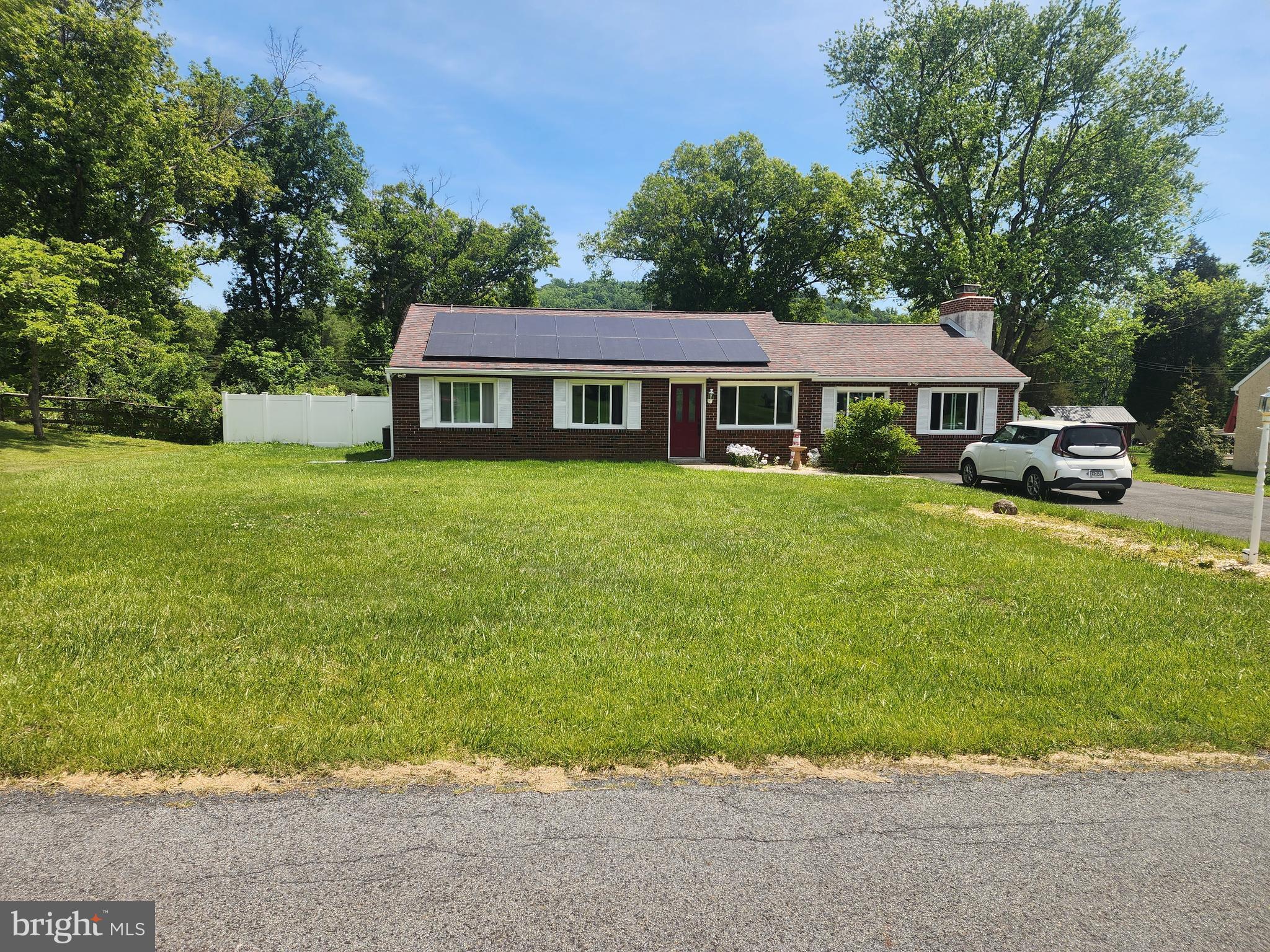 Welcome to 8 Mary Jane Street, a charming ranch-style home located in the highly sought-after Perkiomen Valley School District. Nestled in Spring Mount, this well-maintained property offers 3 bedrooms and one and a half bathrooms, providing comfort and functionality for a variety of lifestyles. Inside, you’re welcomed by a bright kitchen with plenty of cabinets & a built in beer fridge, Just beyond, you’ll find the true heart of the home—a spacious family/ living room with an abundance of natural light and large brick fireplace. This space overlooks a large fenced rear yard with 2 sheds creating an outdoor retreat. The main level also includes three bedrooms, along with a full hall bathroom.  Downstairs, the full basement provides a laundry area with washer & Dryer and plenty of storage space. Parking is a breeze with a large driveway. Don’t miss the opportunity to make this wonderful home your own—schedule your private showing