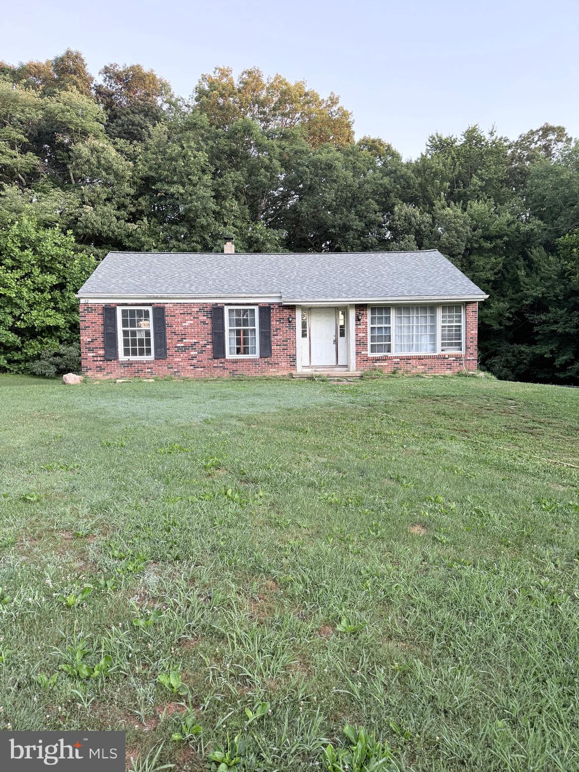 CASH ONLY. This house needs major rehab, but has so much potential!  With 1562 sf of above grade living space and sitting on 5.75 acres, the original home previously had 3 bedrooms and 1.5 baths., now there is just studs/framing throughout,  Roof is less than a year old and new well pump and well components replaced in 2024. Water softener added in 2025 as well  Approximately  2 acres is tillable land and the rest is wooded.