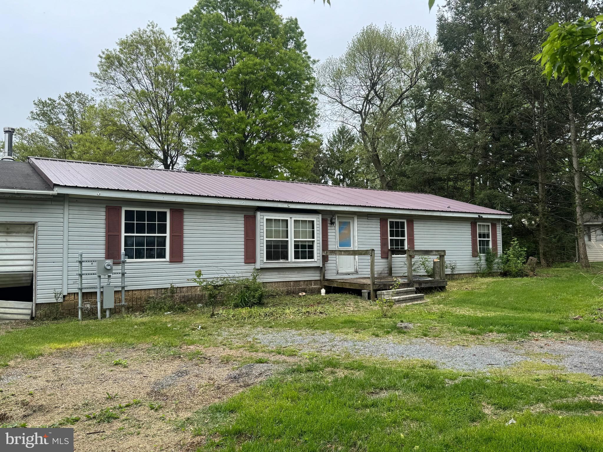 This manufactured ranch-style home sits on a spacious 0.54-acre lot in a quiet, laid-back residential neighborhood. The property requires a full renovation, making it an ideal opportunity for investors, flippers, or buyers looking to customize a home from the ground up. With solid potential and plenty of land to work with, this is a great project for anyone with a vision to transform and add value. The property is sold "AS IS".