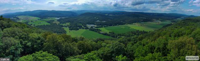 Discover an extraordinary opportunity to own 10  recently cleared acres of gorgeous, undeveloped land on highly sought-after Toms Knob Approach in Lost River, West Virginia. Immerse yourself in the tranquility of the West Virginia mountains, with abundant wildlife and opportunities for hiking, hunting, fishing, biking and exploring nearby Lost River State Park and Trout Pond Area of GWNF. This is a rare chance to acquire one of the last remaining view lots in the coveted Lost River POA, offering breathtaking panoramic vistas that stretch for miles across the Appalachian landscape. Imagine winding down your day with vibrant sunsets painting the sky on your newly built screen porch or deck. This property boasts unparalleled, long-range mountain views that are increasingly scarce in the Lost River area. This expansive parcel provides a blank canvas for you to create your ultimate mountain retreat, whether it's a custom-built dream home, a secluded cabin, or a private sanctuary for outdoor enthusiasts.
Lost River, WV  is a charming community known for its serene environment, outdoor adventures, and a relaxed pace of life, yet remains accessible to larger metropolitan areas. This 10-acre parcel on Toms Knob Approach offers the perfect blend of seclusion and convenience. Don't miss out on the chance to own a piece of this dwindling natural beauty. This is more than just land; it's an opportunity to build a legacy and experience the best of mountain living. 
Nearby Attractions include: Lost & Found Pizza & Provisions, Lost River Farmers Market, Trout Pond Recreation Area, The Guesthouse of Lost River, The Lot River General Store, Lost River Yoga, Lost River Butcher Block, H&T Farmers Market, Lost River State Park.