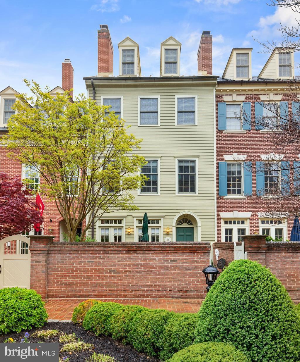 Located in sought after Harborside neighborhood, this pristine renovated townhome offers a beautiful patio and courtyard, an interior elevator,  3 gas fireplaces, a renovated kitchen, 2 BR and 2.55 Baths.  A sun filled living room  features 9' ceilings,  detailed moldings, hardwood floors, a fireplace, and French doors that open to the private courtyard facing south.  Beautifully landscaped, this courtyard is perfect for entertaining or summer dining.  An office with custom built-ins adjoins the living room.  The sparkling renovated  kitchen features new stainless steel appliances, quartzite countertops and backsplash along with additional cabinetry in the laundry room.  The luxurious  master suite is 3 windows wide allowing natural light all day,  offering a wall of handsome built-in wardrobe drawers flanking the fireplace and custom closets, with a renovated master en suite bath.  The 4th level is a perfect guest retreat with skylights, a spacious full bath and plenty of closet space.  There is off street parking deeded in the garage below.  You are just a short walk to the Potomac River's edge as well as to Kings Street's fine restaurants and interesting boutiques!
