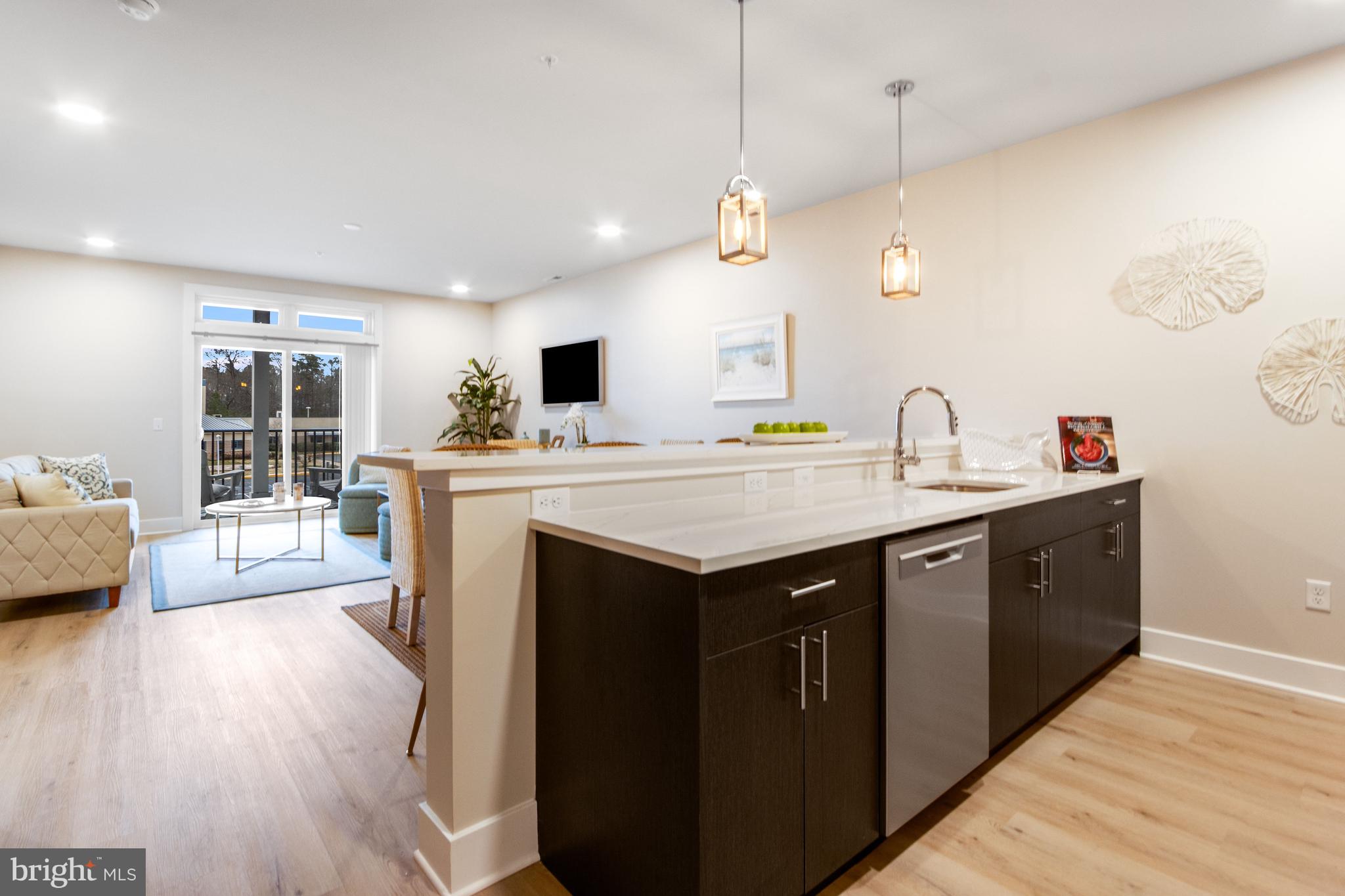 FLATS AT COASTAL STATION - Residential
