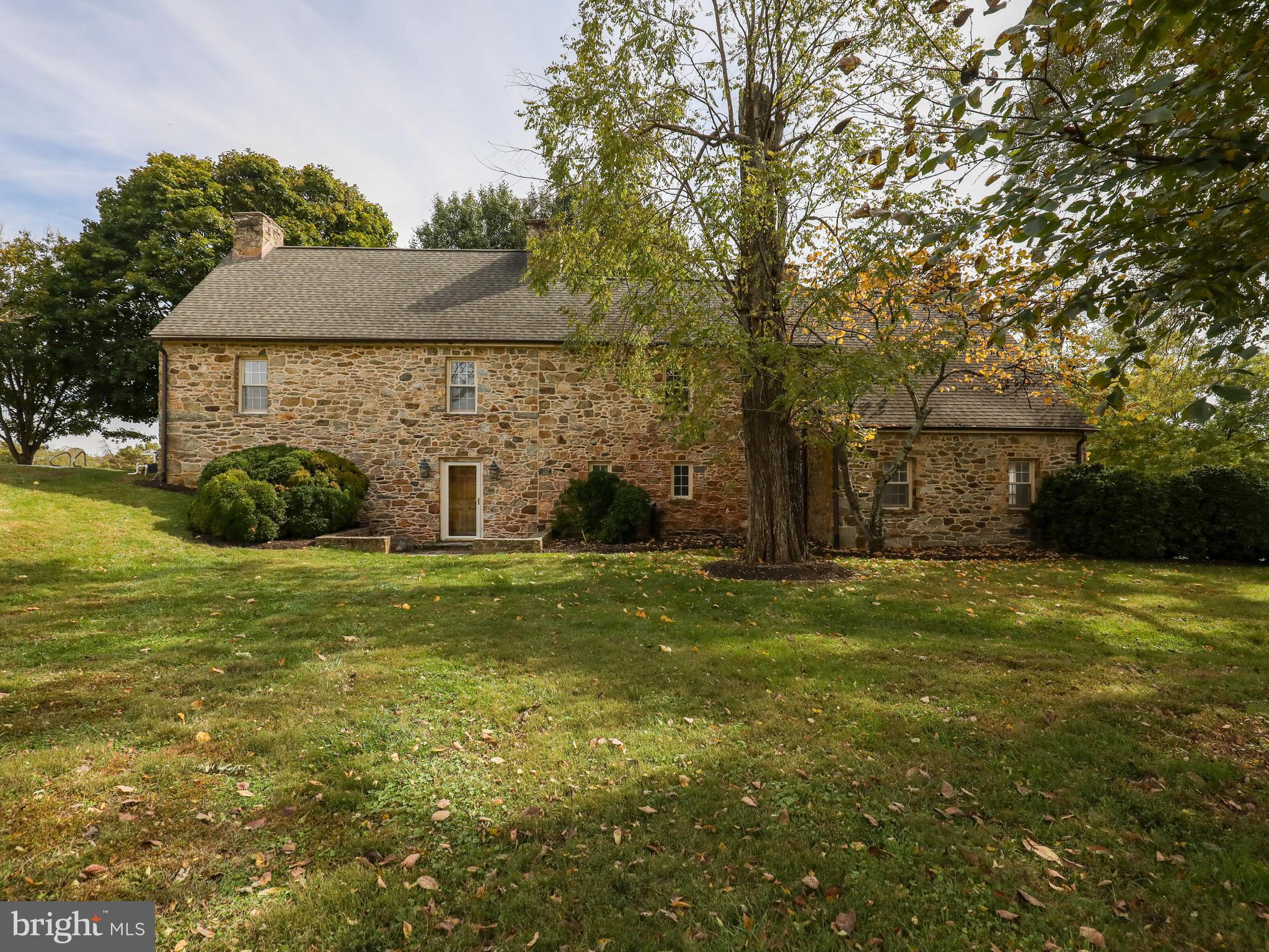 18th Century stone home on 34+ acres, Home has 5 bedrooms, 41/2 baths 4 fireplaces, beautiful views. This horse property has a period stone bank barn with fenced paddocks.