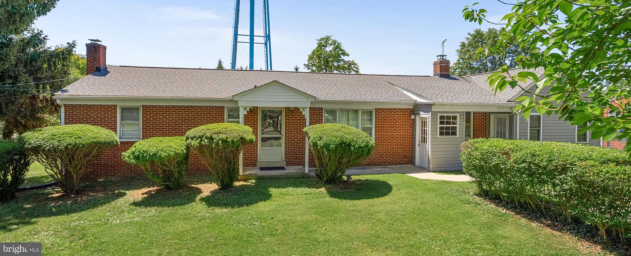 Enjoy one-level living on an in-town half-acre lot, featuring nearly 1,800 sq. ft. of finished space plus a full walk-up basement. Originally built in 1962 with an addition added in 2003, this home offers flexible living options and comfortable room to grow.

The original home includes 3 bedrooms, 1 full bath, a living room, kitchen, dining area, and a family room with a fireplace—along with a full walk-up basement. The 2003 addition adds a kitchenette area, living room, bedroom, and a full bath with a handicap-accessible shower, plus washer and dryer. Perfect for multi-generational living, caregiving, or anyone who wants space for a loved one, this property is set up to provide privacy while keeping everyone close. This is the first time the home has been offered for sale—proudly maintained by the original family since it was built—creating that warm, inviting feel the moment you walk in. Outside, you’ll find a generous in-town level yard with multiple sheds, ideal for gardening, hobbies, or extra storage. The home is waiting for its next owner to make lasting memories.

All that Lovettsville has to offer is right here: shops, restaurants, a library, pool, community center, and a 90-acre park. Plus, nearby MARC commuter rail provides convenient access to Washington.