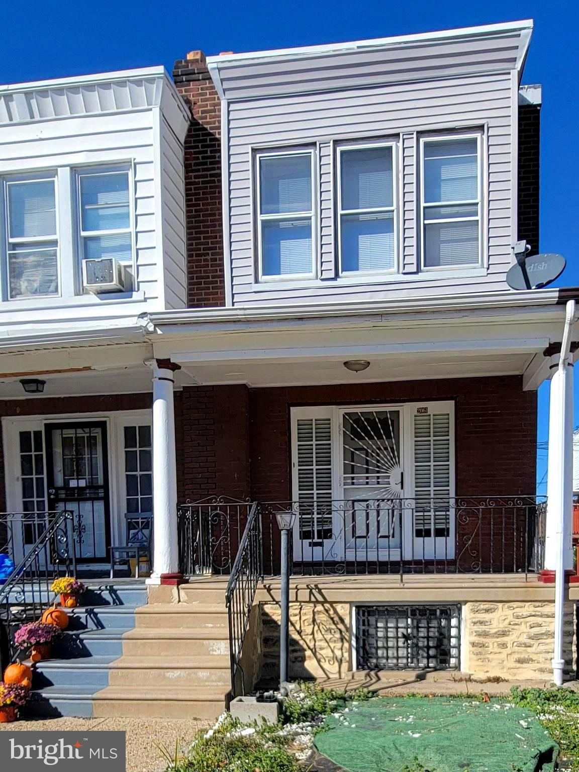 This beautiful cozy corner row home in West Oak Lane is a great way to bring in the summer season while also boasting a great entry level price. Are you ready for your new home? Well welcome to 2061 Independence Street located on a quaint one-way street. It is the perfect 2-bedroom home for someone tired of renting, wants to downsize or minimize their current living environment or just add a solid home into their portfolio for a long-term investment. This end of row townhome offers an exterior front covered porch for relaxation even on rainy days. There is a fenced in rear yard for those family cook outs or for simply hanging out. The 1st floor offers living room space with gleaming hardwood floors as well as an eat in kitchen. The 2nd floor has 2 bedrooms and a full bathroom and both levels have recently been painted. The owner has completed positive upgrades such as having a new hot water heater installed, complete upgrade of electrical throughout and main roof coating in an effort to make the new owners living comfortable for years to come. The basement is the length of the home and has high ceilings.  It could be perfect for your storage needs or to consider finishing to use as additional living space. Please put this on your list of homes to see and make this cozy home your next home. This property is also available for rent.