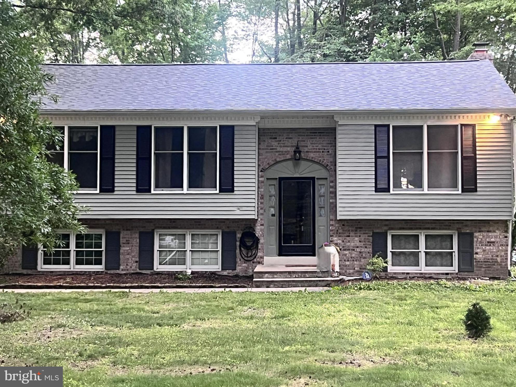 Welcome to this beautifully maintained raised ranch in Hickory Woods, Bear, Delaware, built by well-respected local builder RC Peoples and ideally situated in a prime location in the neighborhood in a cul-de-sac offering rare peace and privacy.

What makes this home stand out in Bear, DE?
This 3-bedroom, 2-bath home features hardwood flooring throughout the main level and thoughtfully updated bathrooms, combining timeless style with modern comfort. A brand new roof! Natural light fills the living spaces, creating a warm, inviting environment perfect for everyday living or entertaining.

How is the outdoor space?
Step outside to a spacious elevated deck overlooking a private, tree-lined backyard, creating a serene retreat. The lower level adds valuable living space with a cozy wood-burning fireplace and sliding glass doors that open to a paver patio, deal for indoor-outdoor gatherings and relaxing evenings.

Why choose Hickory Woods in Bear, Delaware?
Located in the desirable Hickory Woods neighborhood, this home offers convenient access to major routes including Route 1 and I-95, making commuting to Newark, Wilmington, and Middletown simple. Enjoy proximity to shopping, dining, and everyday essentials while still coming home to a quiet, established community.

Who is this home perfect for?
Buyers looking for a move-in ready home in Bear, DE with functional living space, a peaceful setting, and a private backyard will immediately recognize the value this property offers.

OPEN HOUSE CANCELLED!  UNDER CONTRACT!!!