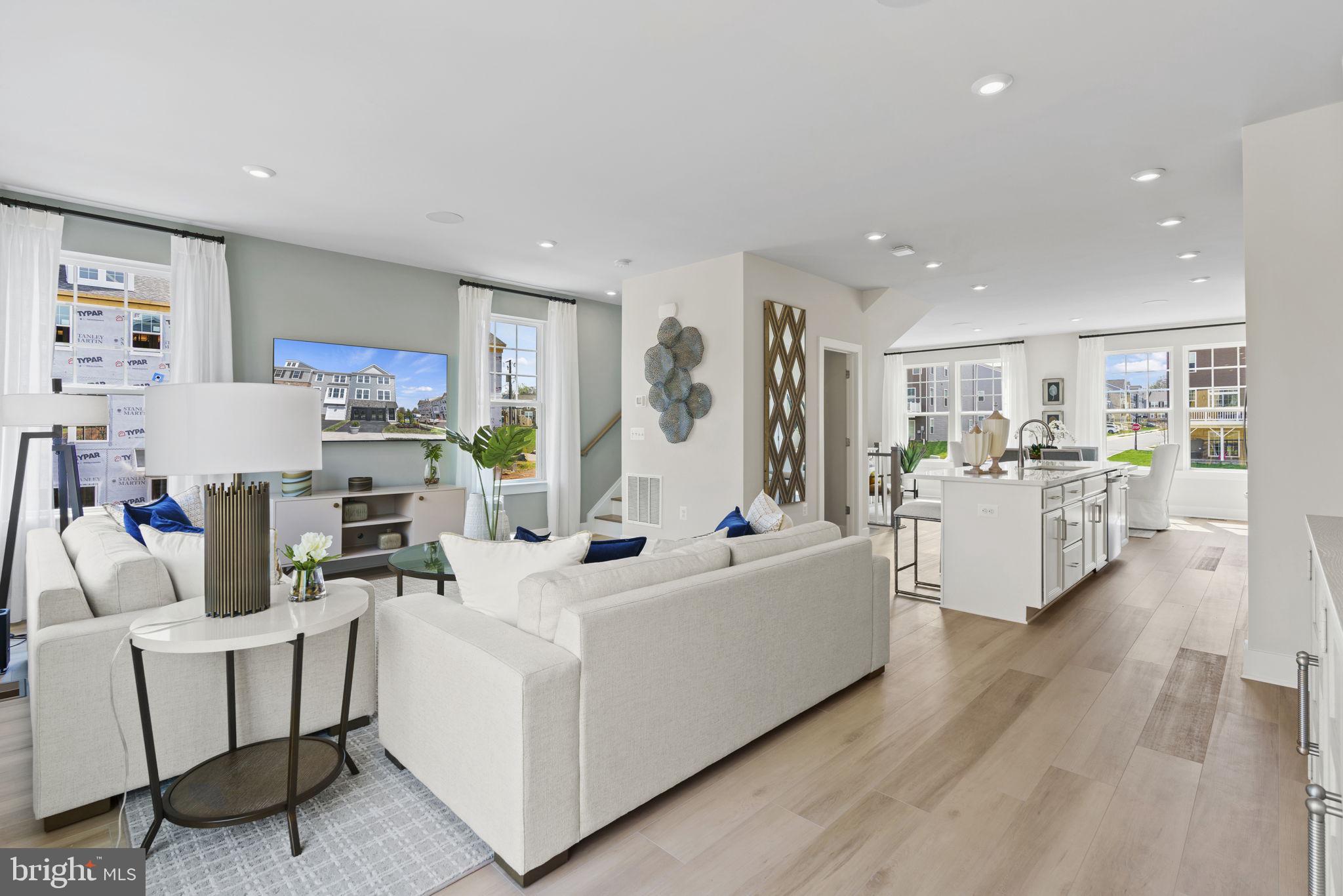 Stunning Rare End Unit, new 3-level townhome! The popular Stanley Martin Maya home design is all about flexibility. This homesite is a 3-bedroom townhome with the potential for guest space in the basement, featuring an open-concept floor plan with enhanced finishes, an expansive island that seats up to six, and generous walk-in closets. A large, yet cozy family room and dining area make this space feel complete. Relax and take in the sky view from your oversized maintenance-free deck and entertain on your expansive main floor featuring 10 ft. ceilings. At the end of the day, retreat to your primary suite with a private en-suite bath. The room may become your favorite and will certainly inspire you to put your feet up and relax. Or enjoy your very own backyard space. Imagine watching the sunset in a community surrounded by the Potomac River. Potomac Shores is unparalleled when it comes to amenities. Experience the endless opportunities to bike, walk, run, swim, golf, workout, canoe, kayak, boat, fish, or simply enjoy a seat in front of the firepit at the Golf Club restaurant open to all Potomac Shores residents. Enjoy a walk throughout the tree-lined community on over 85 miles of wide paved trails or a hike on the intertwining woods trails. Sign up for a plot at the community Gardens, or Take the VRE train (projected 2024) to D.C. then back for a stroll through the future town center on the water. Enjoy the convenience of two of the three brand-new schools that have been completed. *PHOTOS ARE OF A SIMILAR HOME.* **The price for this home lists the base price, and structural and design options cost. Please contact Sales Representative for approximate additional cost on our new listings. Contact us to schedule a tour or stop by and visit our model home today!