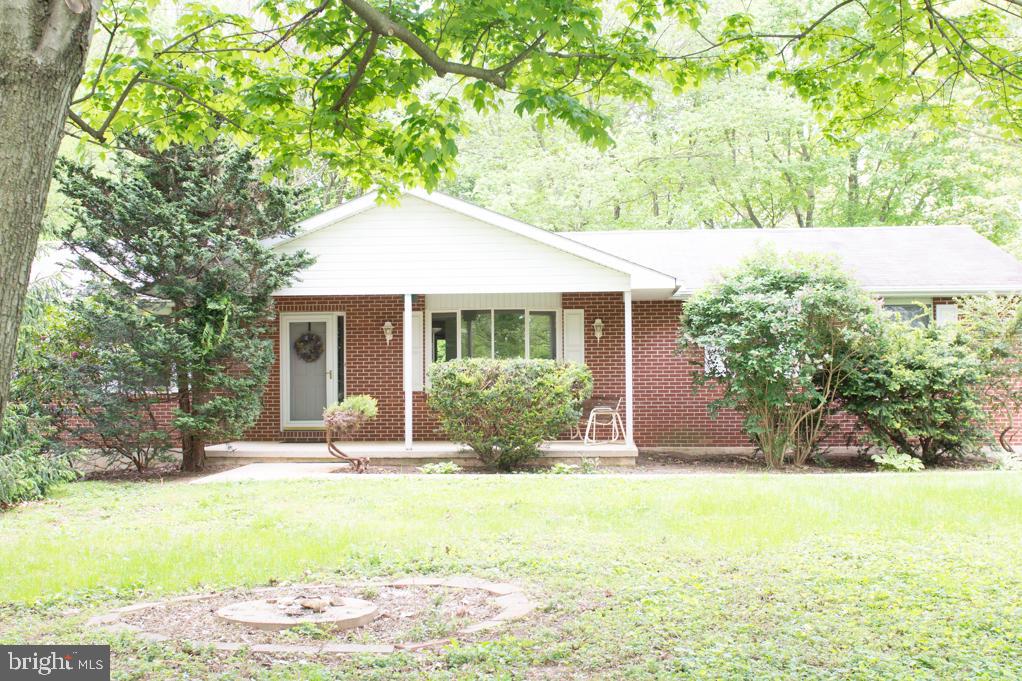 Great rancher in Southern Lancaster County. Ready for your family to make memories in this 3 bedroom, 2 full bath home on a peacefully wooded lot. Enjoy the kitchens  pickled oak cabinets made by Lancaster County Kitchen and the fabulous garden window. The full basement with the outside entrance has endless possibilities.  Refrigerator, washer, dryer and shed included in the sale.