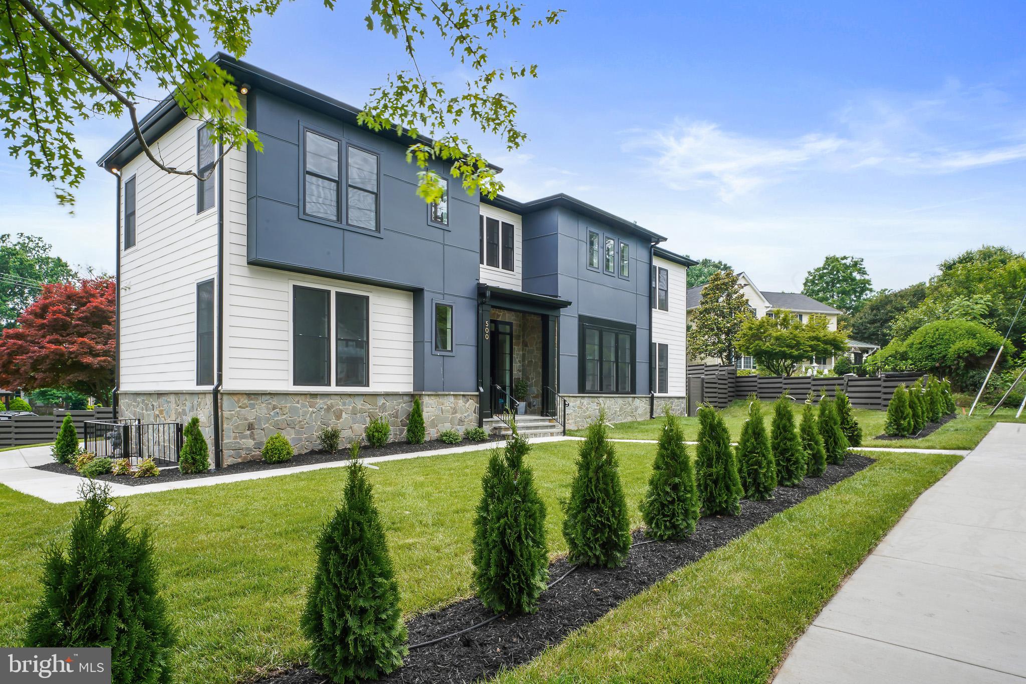 Discover the superb level of luxury living at 500 Malcolm Rd., nestled in the prestigious Windover Heights of the award-winning Town of Vienna. This stunning modern masterpiece, crafted by the esteemed Metro Keystone Builders, showcases an exquisite blend of custom features and high-end finishes across 3 expansive levels, offering a total of 5093 square feet of comfort and elegance.  As you step inside, you will be greeted by the grandeur of 10-foot ceilings, further enhancing the sense of space throughout this magnificent home. With a thoughtfully designed layout, this residence offers 6 bedrooms, each equipped with an ensuite bathroom & walk-in closet, ensuring privacy and convenience for all family members and guests. The main level features a versatile bedroom that can serve as a home office or library, catering to your work-from-home needs or providing a quiet retreat for reading and relaxation. 
    At the heart of this home lies the spectacular gourmet kitchen, a culinary enthusiast's dream. This space is adorned with premium cabinets and top-of-the-line KitchenAid stainless steel appliances, including a built-in refrigerator, microwave drawer,6 burner gas range, and dual sinks. The kitchen's layout is both functional and stylish, perfect for entertaining family and friends. Adjacent to the kitchen, a spacious mudroom offers convenient storage and organization right at the garage entrance. A colossal 7x7 foot pantry ensures you will never run out of space for your culinary essentials.
    Ascend to the upper level, where the owner's suite awaits- a true sanctuary of relaxation. This opulent space features a tray ceiling and luxurious spa-like bathroom complete with double vanities, a separate soaking tub, and 2 oversized walk-in closets. Three additional well-appointed bedrooms reside on this level, each with walk-in closets and a private bathroom.
    Venture to the lower level, where entertainment takes center stage. A dedicated media/theatre room, prewired for speakers, invites movie nights and game days with family & friends. This level also offers additional living space that can be tailored to your lifestyle needs--be it a playroom, gym, or guest suite.
    The exterior of this home is equally impressive, featuring durable Hardie panels and fiber cement lap siding, complemented by stone veneer for added elegance.  The maintenance-free composite decking and railings on the outdoor deck provide a perfect spot for al fresco dining and entertaining. The builder has added 40+ evergreen trees to the front and side of the home for added elegance and privacy. The rear and side yards are fenced to coordinate with the exterior finish of the house. The garage interior is fully finished and even includes an electric car charger.  
    Vienna is a prime location with community charm! Situated in one of Vienna's most desirable neighborhoods, 500 Malcolm Rd. is a short walk away from the METRO, shopping centers, gourmet restaurants, cafes, parks, and recreational opportunities. The Town Of Vienna is renowned for its vibrant community spirit, hosting annual traditions such as the Halloween parade, Christmas Tree lighting, Summer on the Green concert series, ViVA Vienna, Chillin' on Church St., July 4th activities & Octoberfest. With close proximity to Tysons, The Mosaic District, and all major transportation routes, this home offers not just luxury, but also the convenience of urban living in a charming suburban setting.