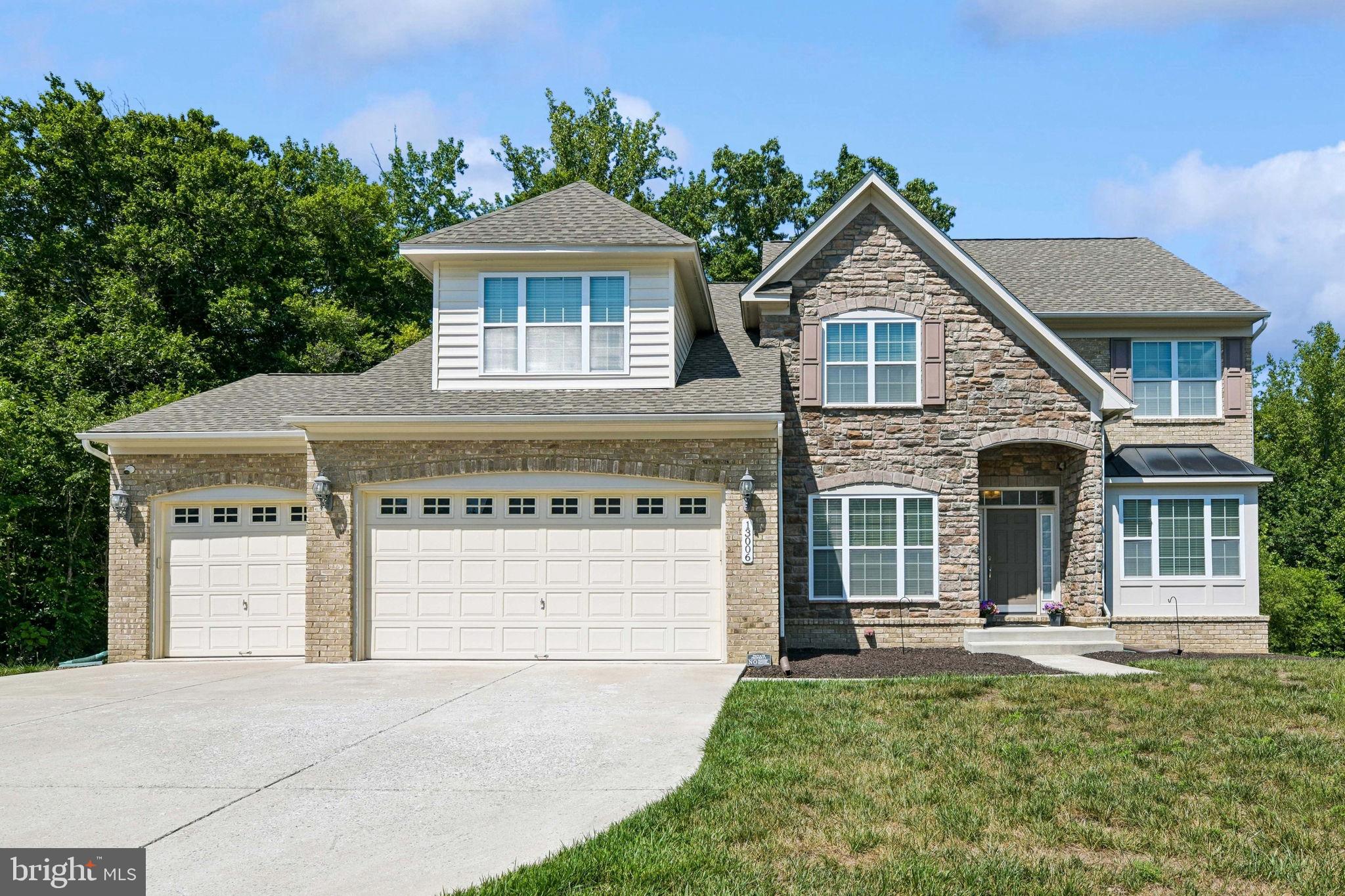 Decorator’s delight—shows like a brand-new model home!! Brick front stunner on 0.5+ acre with 3 car garage at end of Cul-de-Sac! Premium lot which backs up to protected wildlife area! From your back deck & brick patio you will enjoy seeing foxes, deer, etc! Main level offers; an open floor plan, 9 foot ceilings & gourmet kitchen with large center island. Also; living room with fire place & main level bedroom with full en-suite bathroom. Morning/ sunroom opens up to the Trex deck which has steps leading to the paved patio. The master bed room will wow you with its tray ceiling, your dream walk-in closet plus another large walk in closet (separate his & hers)! Spa bathroom with separate his & her sinks, beautiful soaking tub & pass through shower. Walk-out finished basement offers a family room, game room,  bathroom & additional space for storage, extra bedroom or a movie room. French doors open to the patio. Great place to call home.