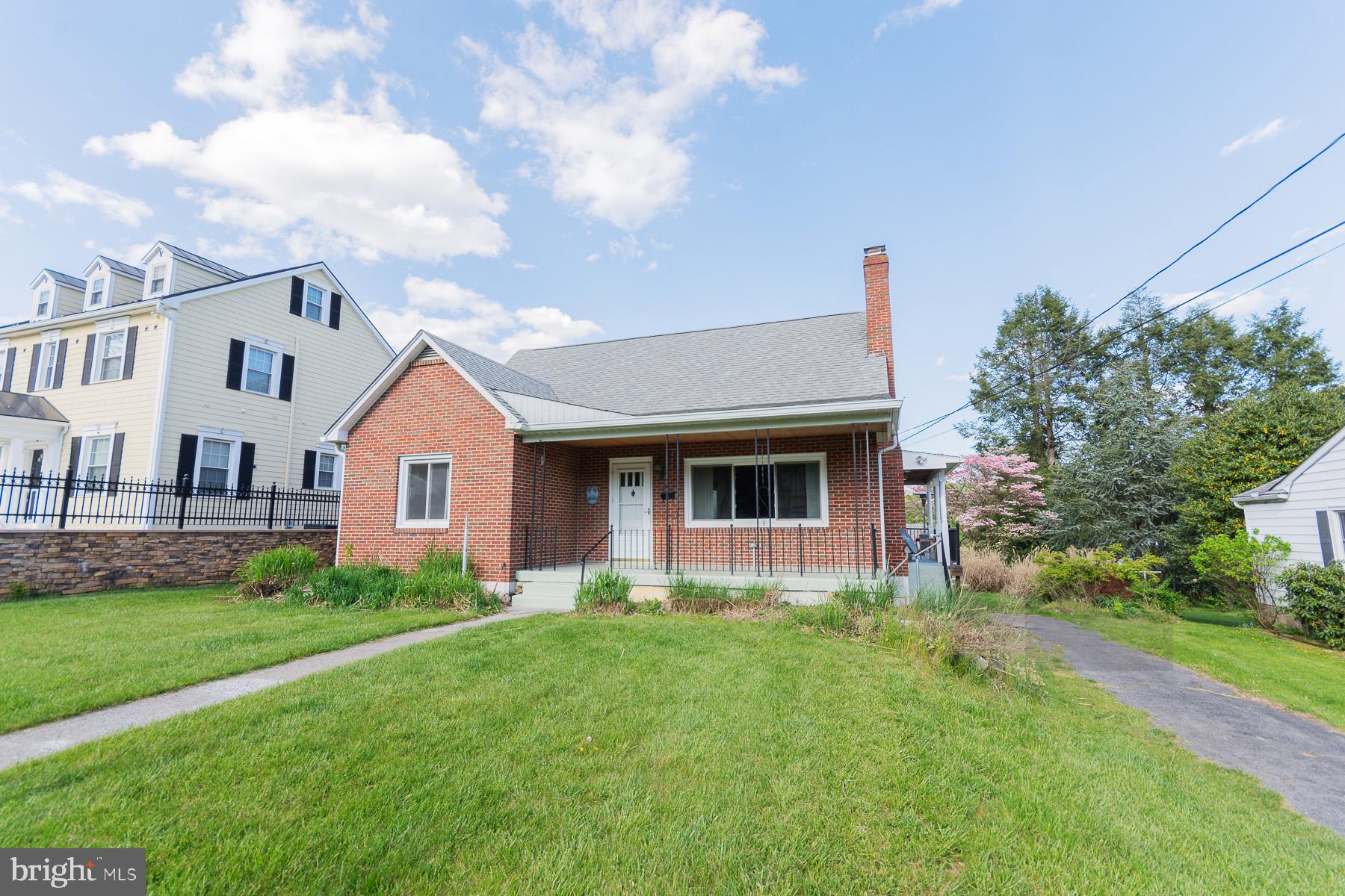 Welcome to your all brick Cape Cod just a few houses away from the Charles Town Park. The park features a pool, tennis court, playground, basketball courts and walking trail. This beautiful home features 4 bedrooms with 2 bedrooms on the main level and 2 upstairs. Both levels with a full bath.  The living room includes a pellet stove, crown molding and hardwood floors. Country kitchen and separate dining room for your family gatherings. Refinished hardwood floors throughout and everything is freshly painted and move in ready. Downstairs there is a rec room and partially unfinished walkout basement. Take time to relax on your newly finished front porch or in the evenings with your 22' by 10' maintenance free Trex deck overlooking your huge backyard. New HVAC system within the last year. Make an appointment today to view this stunning home.