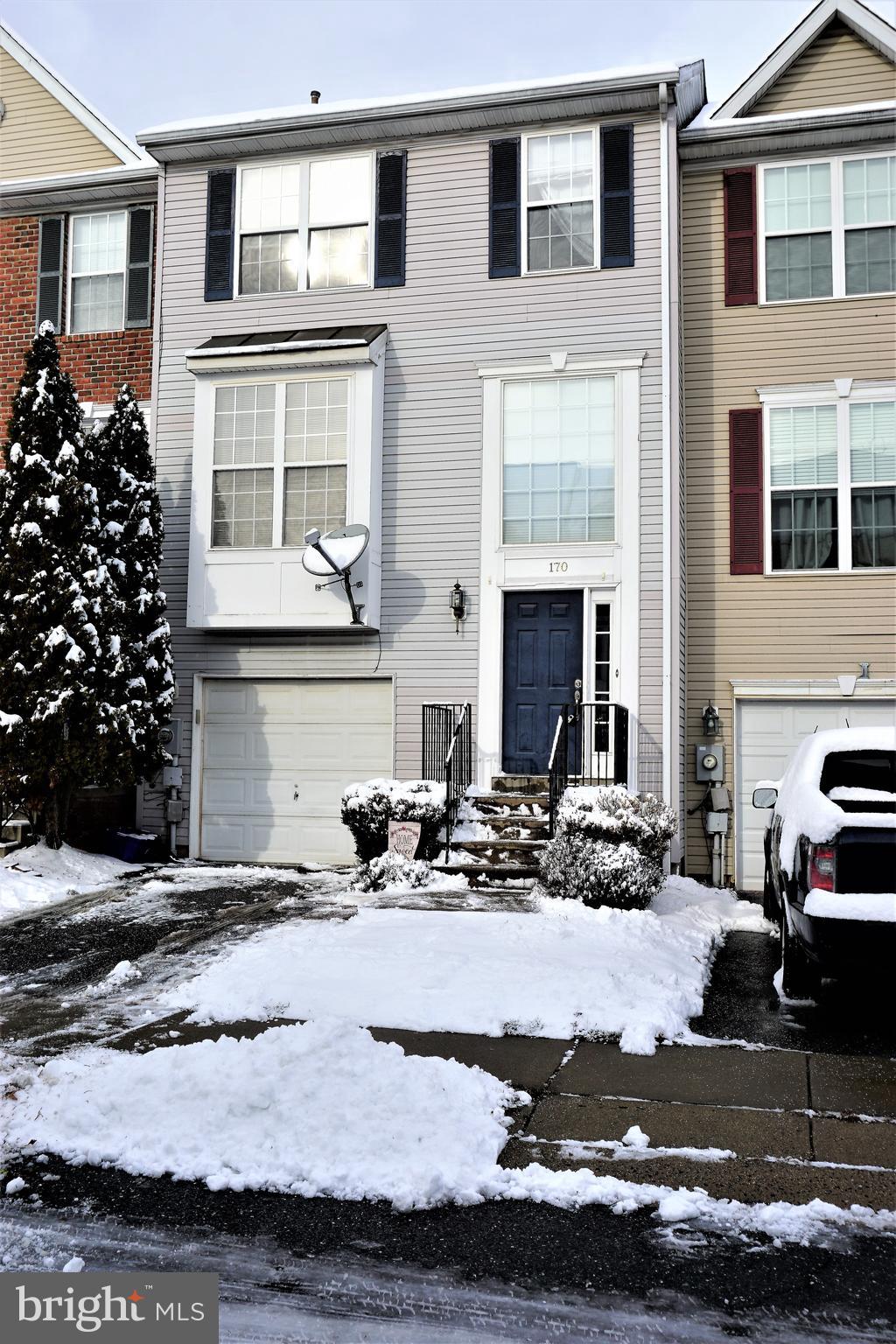 Expansive 3 level GARAGE TOWNHOME (3 bed, 2 full bath, 2 half bath) with 3 LEVEL BUMP OUT!  Openfloor plan with many  upgraded finishes-9' ceilings on main level- BEAUTIFUL LARGE FARMHOUSE KITCHEN  featuring , White cabinetry, upgraded white fairy quartz countertops, classic backspalsh , new black stainess appliances,large island, custom detailed end caps, black deep, undermount sink , black commercial style faucet , upgraded lighting and plenty of space for a large farmtable! Deck off kitchen to enjoy the private rear that backs to common area and has stairs to lower level. Main level, staircases & foyer features hardwood floors, Substantial Master suite is complete with double door entry,  2 walk in closets, cathedral ceilings, a true sitting area & large master bath with dual sinks, separate soaking tub, separate glass shower. Lower level rec room is huge with low maintence laminate plank floors and a cozy gas fireplace. Walk  out to a fenced rear yard! Home has tasteful paint palette, NEW ROOF 2021 & NEW  UPGRADED CARPET 2022.This townhouse is conveniently located off the Christopher Crossings exit in the highly desirable community of North Crossing, near Wegman’s and close to commuter routes, restaurants, shopping, and more. THIS ONE WILL GO QUICKLY- Don't let the snow stop you from seeing this large unit, schedule a showing today! Sellers request the use of FRIENDS TITLE & ESCROW.