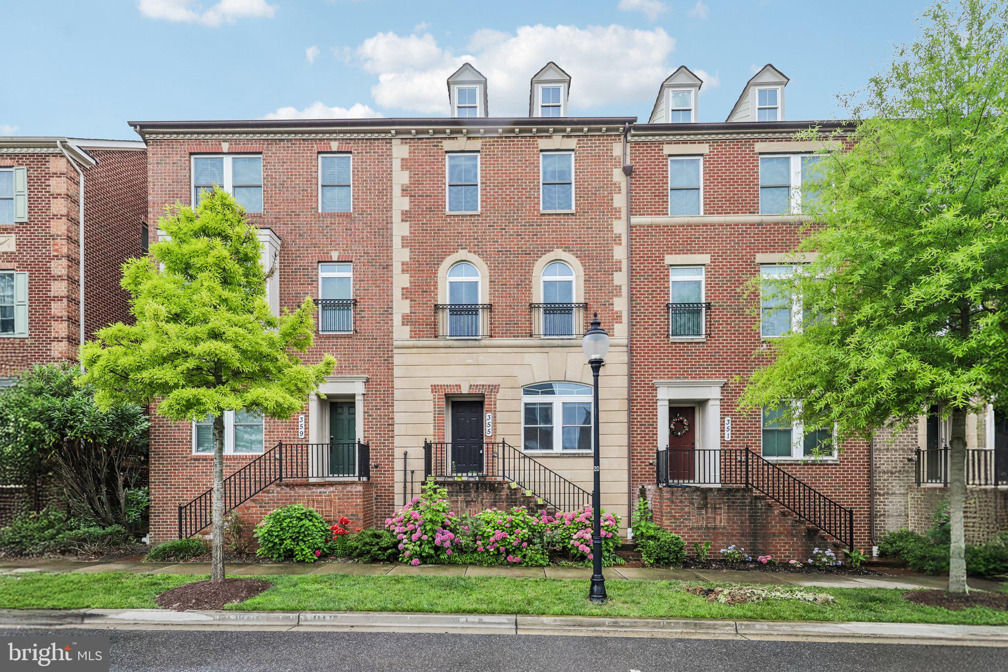 Elegant features, an open floor plan, lively community amenities, a location with unmatched convenience, and impeccably maintained; this mid-level entry colonial revival townhome is everything you're looking for. An open plan design, and 9' ceilings bring light and warmth to the main living level and at its center is a kitchen that would make any chef proud. Upstairs, the primary suite is its own retreat with gorgeous bath, and walk-in closets. While the top level features a fourth bedroom or den,  and a roof deck, third full bath. This is a home begging to welcome friends and family alike, and it's easy to do so with a two car garage, 2 car driveway, and open parking along the tree lined street directly in front.
The Parklands at Watkins Mill Town Center offers a rare combination of amenities and convenience. Parks, playground, pool, tennis court, pond, tree lined streets, a clubhouse with a gym and party room, and several sculptures give life and personality. Walk to the MARC train or ride-on, or you can be on 270 in less than a minute, and it's about 10 to Shady Grove metro. Rio, Crown, Kentlands, and Germantown Town Center are all just moments away with more than 60 restaurants and 20 grocery stores within a 10 minute drive.