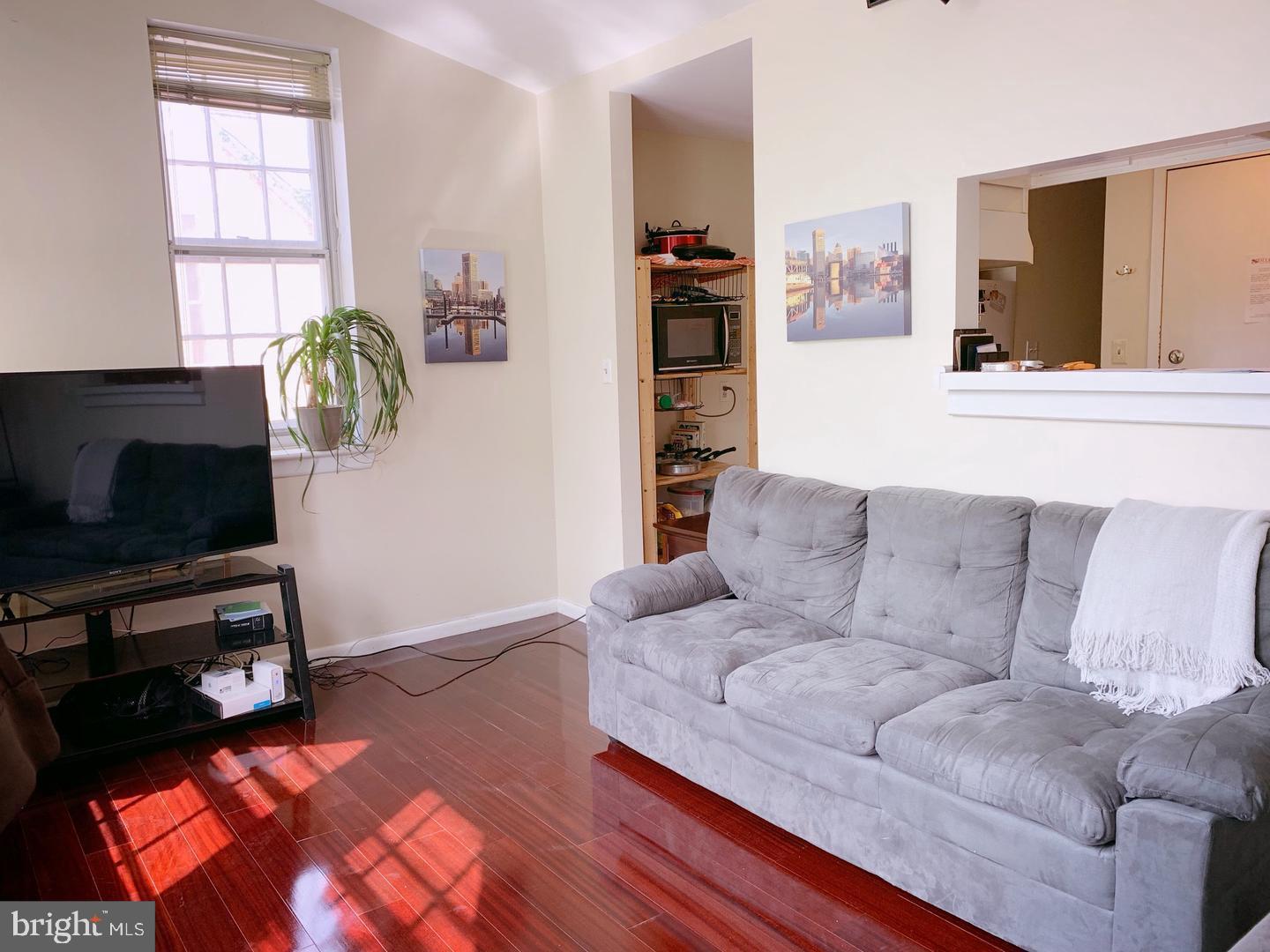 This two bedroom one bathroom is located in the Otterbein where Camden yards, the Baltimore Inner Harbor, Federal Hill, and the University of Maryland are only a 5 minute walk away. The natural cherry wood floors are brand new along with the stove and the central air conditioning unit. This second floor apartment has a beautiful view of the Orioles stadium and sits on a quiet tree lined street surrounded by brilliant historic homes.