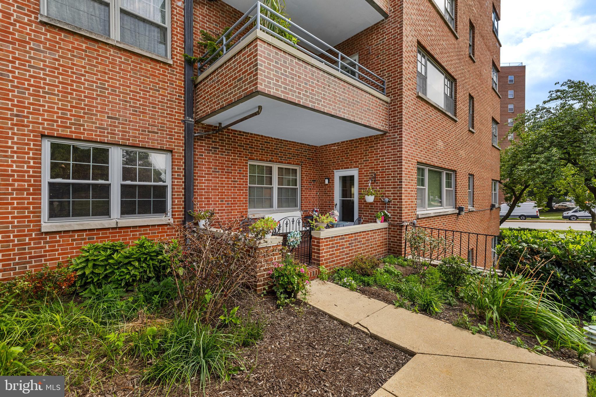 A rare opportunity to own in the iconic Carrollton Condominium! Ideally located just steps from Johns Hopkins University, Guilford Gateway Park, and only minutes from the shops and restaurants of Charles Village, this rarely available entry-level residence with it's own private entrance, offers the perfect blend of timeless character and everyday convenience.
Spacious 2-bedroom, 2-bath home features soaring ceilings, oversized bedrooms, beautiful parquet wood flooring, and an updated white kitchen with abundant cabinetry. Both bathrooms offer classic, timeless finishes, while replacement windows fill the home with natural light. Enjoy the convenience of your own private walk-out patio, creating an easy indoor-outdoor lifestyle. Endless storage throughout adds to the home's exceptional functionality.
The sale includes a separately deeded parking space and storage unit. Residents of The Carrollton enjoy an array of amenities, including 24-hour front desk service, a welcoming lobby, community gathering spaces, and a convenient laundry facility. The Carrollton isn't just a condominium—it's a lifestyle. Don't miss this rare chance to own one of its most desirable residences.