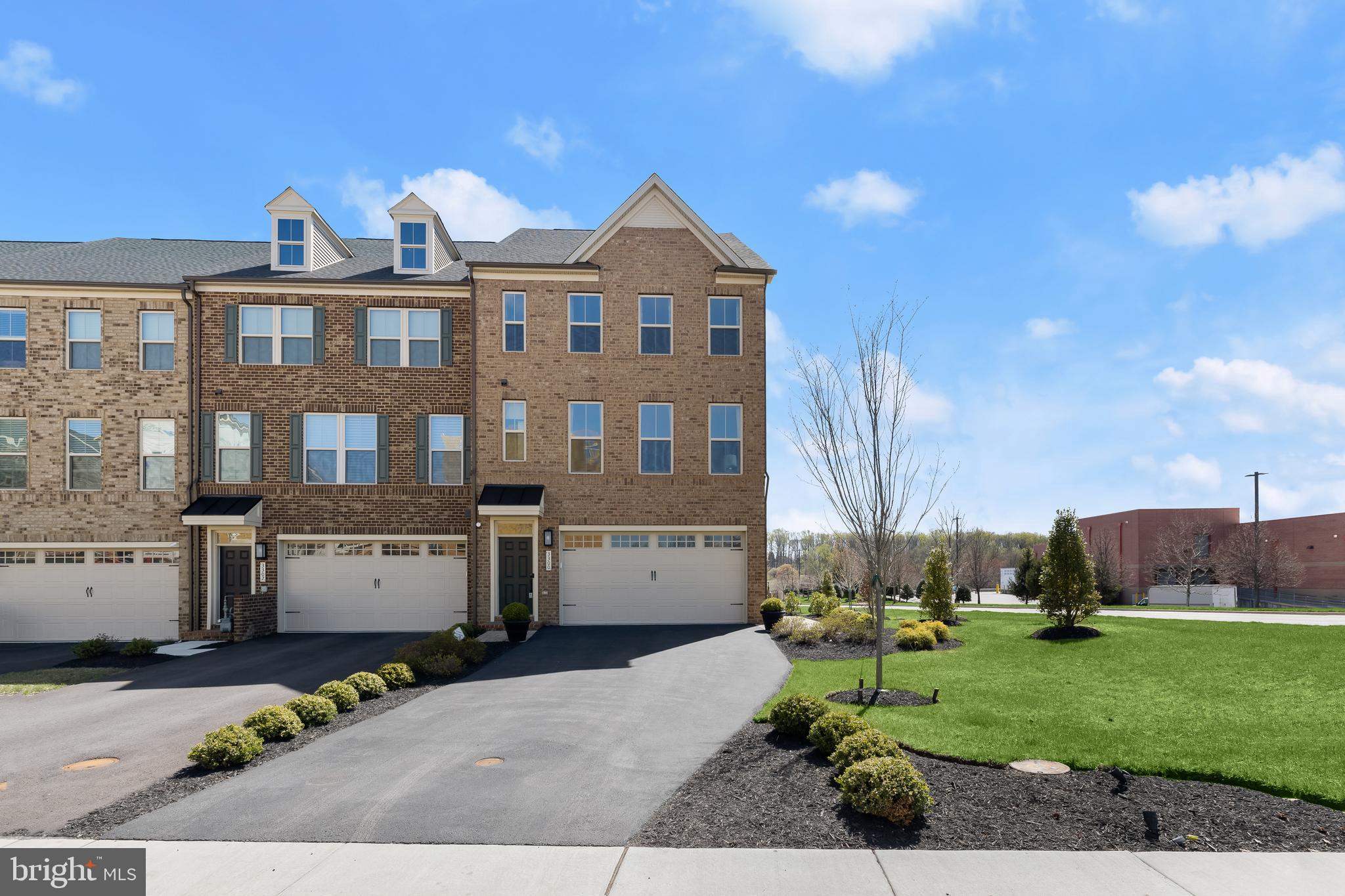 Stunning and newly built, this luxury NV corner-unit townhome is a masterpiece of modern design and convenience. Formerly a model home, it boasts light-filled interiors with soaring ceilings, oversized windows, and recessed lighting that create an airy, inviting atmosphere. The beautiful kitchen is a chef’s dream, featuring quartz countertops, gas cooking, an oversized island with a breakfast bar, a sleek decorative glass tile backsplash, and a spacious pantry. The custom semi-enclosed deck is perfect for entertaining, offering an outdoor fireplace with stone accents and a mounted television. Professionally designed interiors exude sophistication, enhanced by smart home functionality with app-controlled lighting, outlets, and a state-of-the-art 2-panel alarm system. Stay connected with commercial-grade WiFi supported by $2K of networking gear, Power over Ethernet (PoE) with battery backup, and Ring cameras/doorbell for added security. USB outlets are thoughtfully placed throughout. The GE Profile smart appliances and a whole-house humidifier further elevate the home’s comfort and efficiency. Additional features include a heated and air-conditioned garage with a sealed floor, an irrigation system, and a convenient school bus stop right in front of the house. This impeccably finished townhome is not just a residence but a lifestyle. Steps away from the shopping center and Turf Valley. Don’t miss the opportunity to make it yours!