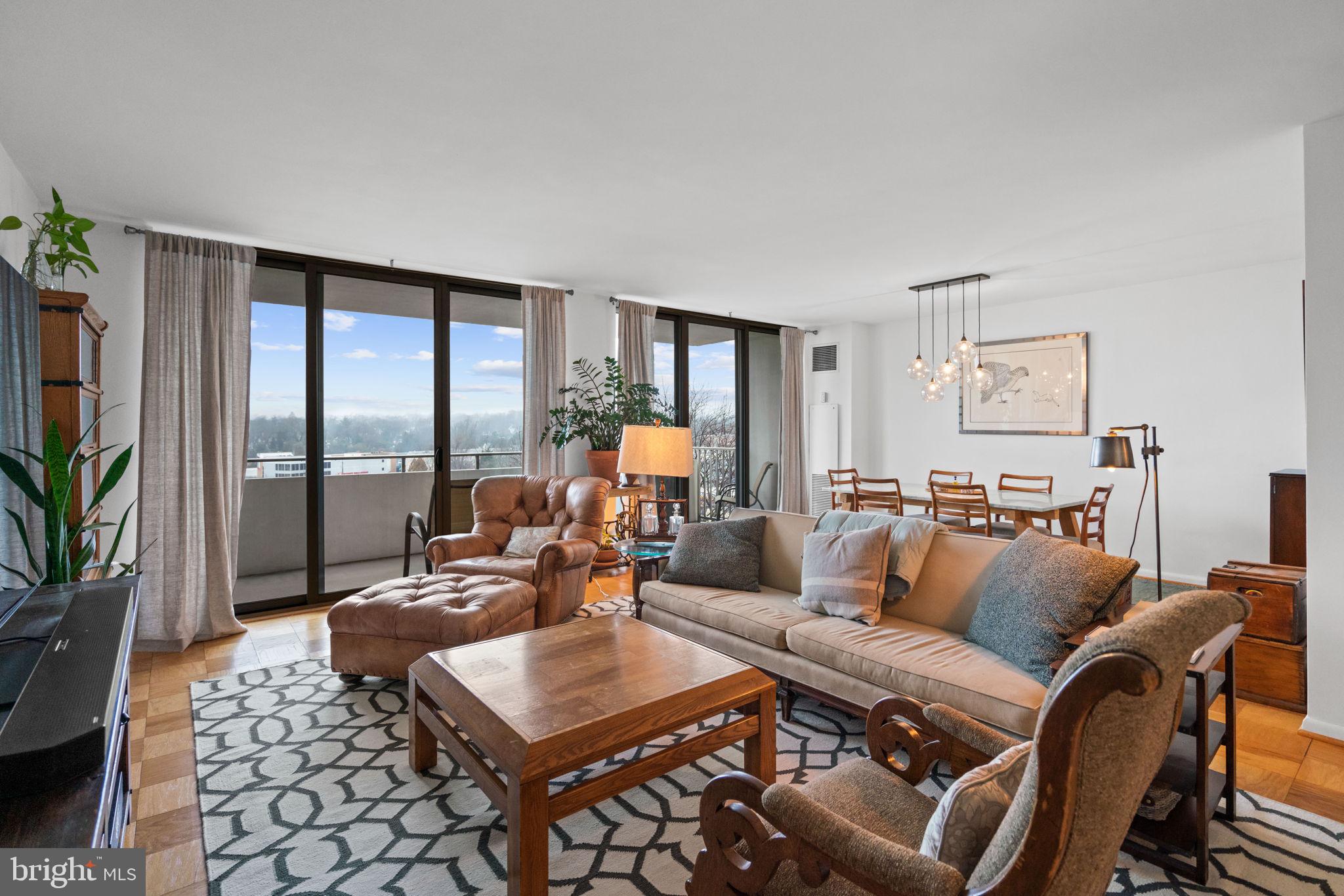 Sunset views and easy-living. Welcome to this expansive, light-filled two-bedroom / two-bathroom corner-unit with one deeded parking space (plus guest garage parking!) delivering comfort and convenience at the Kenwood Condominium in Bethesda. 

Enjoying 1,467 +/- square feet of living space with exquisite details, including parquet flooring, floor-to-ceiling windows, and a private balcony with soaring tree-lined city views. The spacious, sun-filled combination living / dining room enjoys sliding glass doors to the private balcony and is connected to the kitchen, creating a wonderful entertaining flow in the home. The kitchen offers stainless steel appliances and a gas stove. Boasting an abundance of storage, this unit has a graciously sized walk-in closet in the primary bedroom. Both bedrooms are generously-sized and have oversized windows. Centrally located in The Kenwood Condominium building, which features 24-hour security/concierge in a recently renovated lobby, a secure mail room, a state-of-the-art fitness center, a large outdoor pool, an expansive meeting room with a full kitchen, a walking path around the professionally landscaped promenade with two picnic areas complete with gas grills and seating, and a laundry room on every floor. 

Just steps to the Capital Crescent Trail, Westbard Square, Whole Foods, Georgetown Bagelry, Giant, and Downtown Bethesda. Westbrook, Westland, and B-CC schools serve the neighborhood. Additional offerings include garage parking, dedicated storage, and all utilities included.