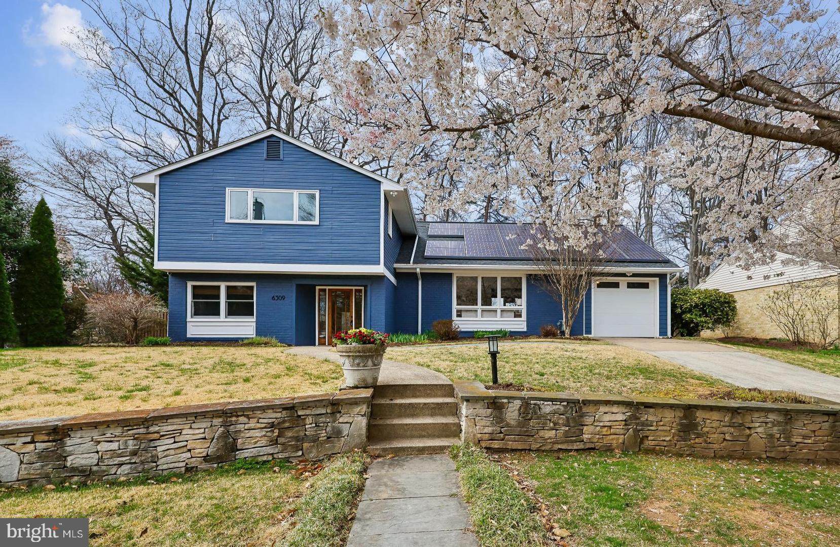Perfectly positioned on a quiet street in sought-after Kenwood Park, this beautifully updated and sun-filled residence offers the ideal blend of timeless design and modern comfort—just moments from Walt Whitman High School.

Freshly painted throughout, the home welcomes you with bright, airy living spaces featuring gleaming hardwood floors, neutral finishes, and oversized windows. The main level offers a gracious living room, an elegant dining room, and a spacious eat-in kitchen with stainless steel appliances, abundant cabinetry and a center island. Just a few steps down, the inviting family room with fireplace creates a warm and relaxed gathering space and provides direct access to the backyard—ideal for seamless indoor-outdoor living.

Upstairs, the expansive primary suite offers a serene retreat with a spa-inspired bath, dual vanities, and a custom walk-in closet. Additional bedrooms are generously sized and share a well-appointed, fully renovated hall bath. A convenient bedroom-level laundry area with a washer and dryer adds everyday ease.

The lower level features a large, newly carpeted basement with a spacious recreation room and an oversized utility/storage area—perfect for additional living space and functionality.

The private, fully fenced backyard is designed for both relaxation and entertaining, featuring a large patio and mature landscaping.

Additional highlights include a main-level bedroom (that makes a perfect home office) with a full ADA bathroom,  recessed lighting, solar panels, and an attached two-car tandem garage.

Enjoy the rare combination of a peaceful residential setting with walkable access to Walt Whitman HS, and close proximity to downtown Bethesda, parks, shopping, dining, and major commuter routes.
