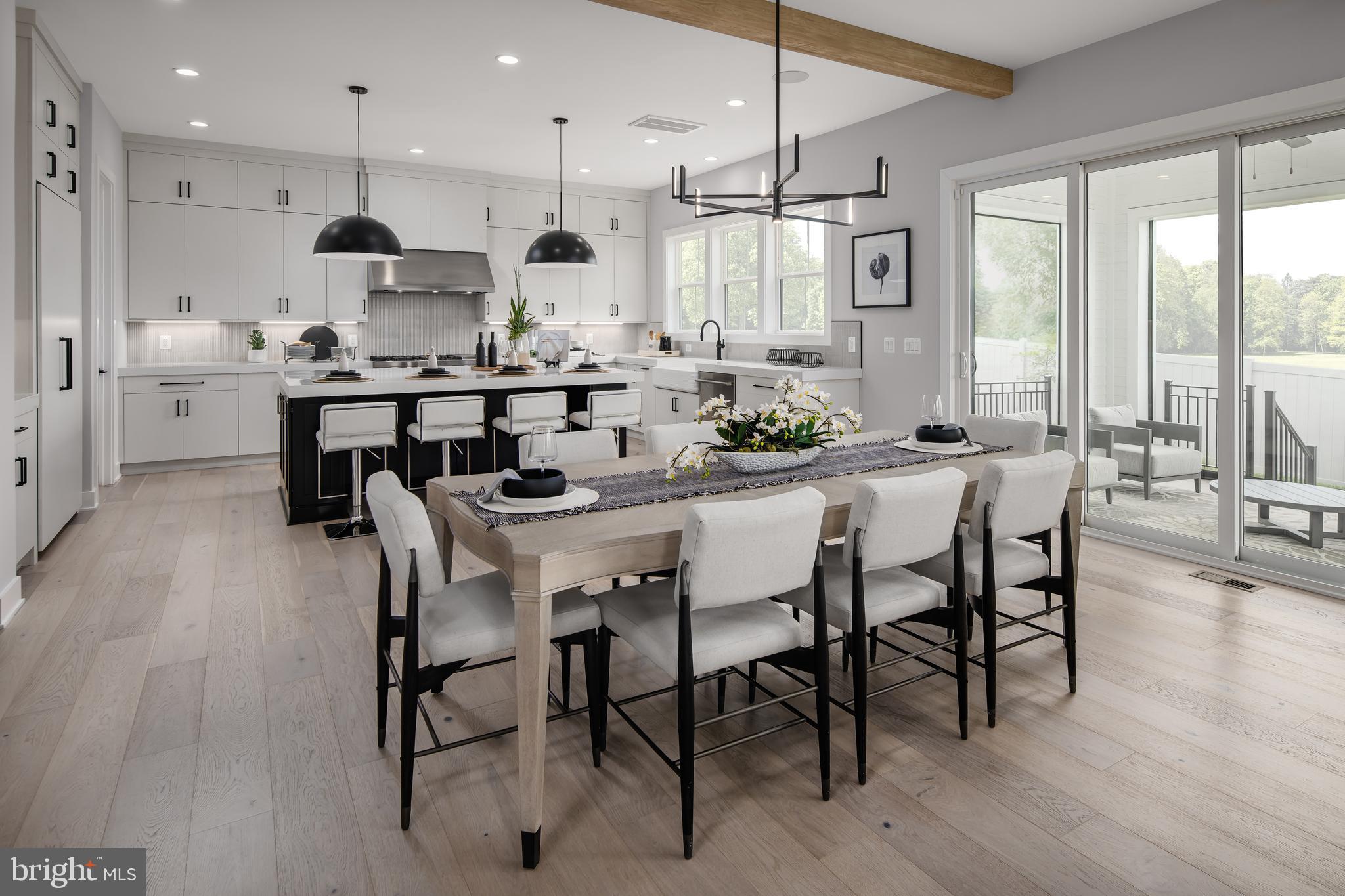 The Grove at Dominion Hills is Toll Brothers boutique single family home community in highly desirable Arlington, VA. This brand-new Rouse home design is now for sale for Summer 2026 move-in. This home is designed for how you live. Enter through your front door into a light filled foyer with soaring 10’ ceilings, spacious office just off the entry with a powder room just down the hall. Your eye will draw you back into the fully upgraded kitchen featuring white cabinets stacked to the ceiling, striking quartz countertops, and stainless-steel Jenn Air appliances. Just off the kitchen is an everyday entry with drop zone and hall closet, ideal for additional storage, which leads to your 2-car garage. Cozy up in the great room with gas fireplace and tile accent wall, adjacent to covered and screened in deck. Upstairs, this home hosts a large primary suite with dual walk-in closets, relaxing primary bath with separate vanities, large soaking tub, and dual sided walk-in semi-frameless shower. On this same level you have three additional generous sized bedrooms, all with walk-in closets and two additional full baths. This level is complete with a laundry room boasting cabinets and a utility sink. Another staircase off the bedroom level travels to the finished 3rd floor walk-up space making this home ideal for every lifestyle. With approx. 722+ sq ft of additional livable square footage, this additional level of the home is sure to be functional – storage closet and full bath included. The finished lower level has a rec room space, wet bar, bedroom, full bath, and ample storage space. This home site is conveniently located near major commuter routes, East Falls Church Metro Station, local parks, shopping, dining, and so much more. You don’t want to miss this dream home – give us a call today!