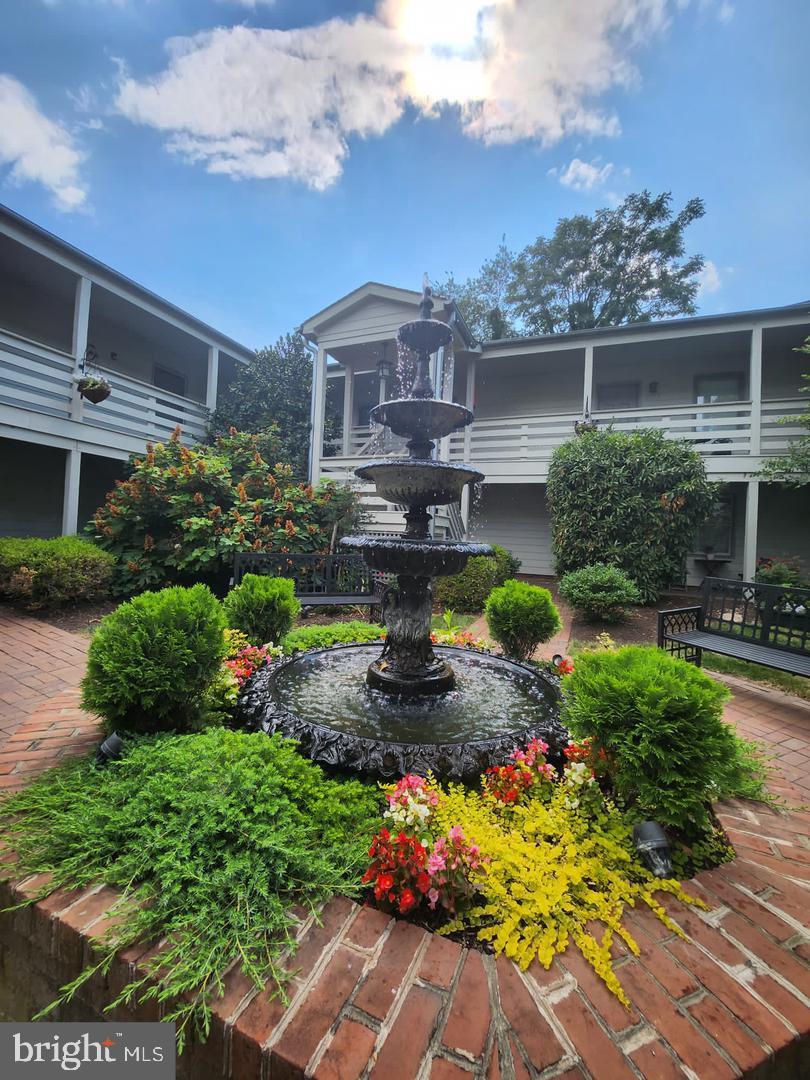 Convenient and private downtown living at its finest! This charming unit is located in the heart of Frederick, just off South Market Street, behind a gated entrance that opens to a beautifully landscaped courtyard with a fountain, lush greenery, and inviting seating areas. Built in 2006, the home features a full kitchen and bath, updated lighting, and stylish flooring throughout. No laundromat trips needed—your combo washer and dryer are conveniently located just outside the bedroom. Enjoy easy access to restaurants, shopping, and downtown activities, all within walking distance. This is an exceptional opportunity to experience downtown living with comfort and security—don’t miss out!