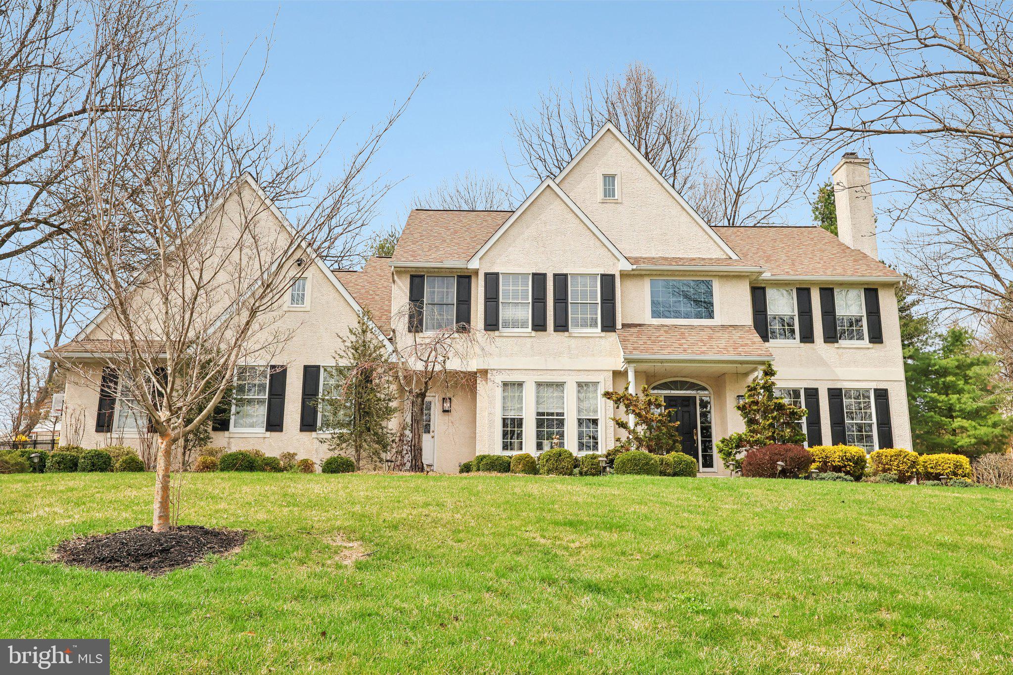 Welcome to 939 Kilduff Circle, a 5-bedroom, 4.5-bath single-family home located in West Chester. Situated on 1.25 acres with a large fenced-in yard, this home offers both space and privacy. As you approach the home, a finished three-car garage, with an electric charging port, offers convenience and ease. As you enter, you’re welcomed by a two-story foyer featuring hardwood floors and chair rail with wainscoting. Just off the foyer is a home office with carpet flooring, crown molding, chair rail with wainscoting, and a triple window with a built-in window seat. The living room features hardwood floors, crown molding, and a wood-burning fireplace with a slate surround, while the dining room offers hardwood flooring, chair rail with wainscoting, and a tray ceiling, perfect for entertaining. The kitchen is well-appointed with hardwood floors, granite countertops, an island with seating, a breakfast area, stainless steel appliances including a Wolf 6-burner gas cooktop, a pot filler, an oven with a warming drawer, pantry, wine refrigerator, and a door leading to the patio. The outdoor space is ideal for entertaining, featuring a beautiful stone patio with a built-in grill and a fully fenced yard. The great room offers hardwood floors, a vaulted ceiling, and a wood-burning fireplace, creating a comfortable gathering space. A mudroom with tile flooring, a separate entrance, and a powder room complete the main level. Upstairs, the spacious primary suite features carpet flooring and a vaulted ceiling. The en-suite bathroom includes tile floors, a vaulted ceiling with skylight, a double sink vanity with a make-up area, a jetted tub, a walk-in shower, and a walk-in closet. Two additional bedrooms on this level feature carpet flooring and share a full hall bathroom with tile floors, a tub/shower with glass door, and a double sink vanity. A fourth bedroom includes its own en-suite bathroom with tile floors and a walk-in shower. The fifth bedroom features engineered hardwood flooring, a ceiling fan, and a window seat. The finished lower level expands the living space with a family room and rec room—ideal for a playroom, home gym, or media space—along with a large laundry room, a full bathroom with tile floors and a tub/shower combination, and a bonus room offering additional flexibility. This home is further enhanced by a Generac generator, a whole-home water filtration system, and a security alarm system, offering convenience, reliability, and peace of mind.Conveniently located near local shopping, grocery stores, restaurants, and more, this home is also just a short drive to downtown West Chester. Don’t miss the opportunity to make 939 Kilduff Circle your new home.