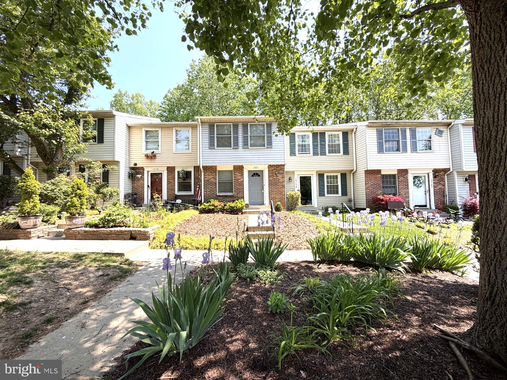 Nicely updated townhome on premium  lot in the back of a cul de sac overlooking gorgeous wooded preserve!  3 finished levels!  Main & Lower level decks! Fenced rear yard!  Many interior updates including beautiful newly refinished main level hardwoods, brand new kitchen cabinets and quartz counter tops, fresh paint throughout, new main level decking & more!  The roof is only about 5 years old as well!  Great parking with 2 assigned spots and additional visitor spaces!  Walk to the beautiful Gunners Lake as well as the community pool!  Great location just seconds from schools, shopping, public transportation, 270 & much more!  Don't miss this one!