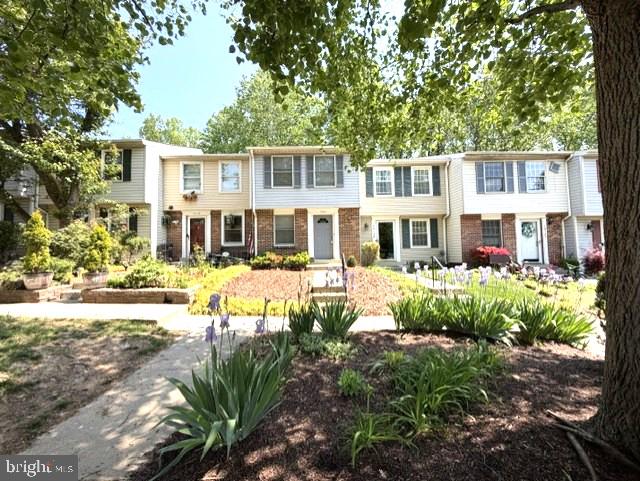 Nicely updated townhome on premium  lot in the back of a cul de sac overlooking gorgeous wooded preserve!  3 finished levels!  Main & Lower level decks! Fenced rear yard!  Many interior updates including beautiful newly refinished main level hardwoods, brand new kitchen cabinets and quartz counter tops, fresh paint throughout, new main level decking & more!  The roof is only about 5 years old as well!  Great parking with 2 assigned spots and additional visitor spaces!  Walk to the beautiful Gunners Lake as well as the community pool!  Great location just seconds from schools, shopping, public transportation, 270 & much more!  Don't miss this one!