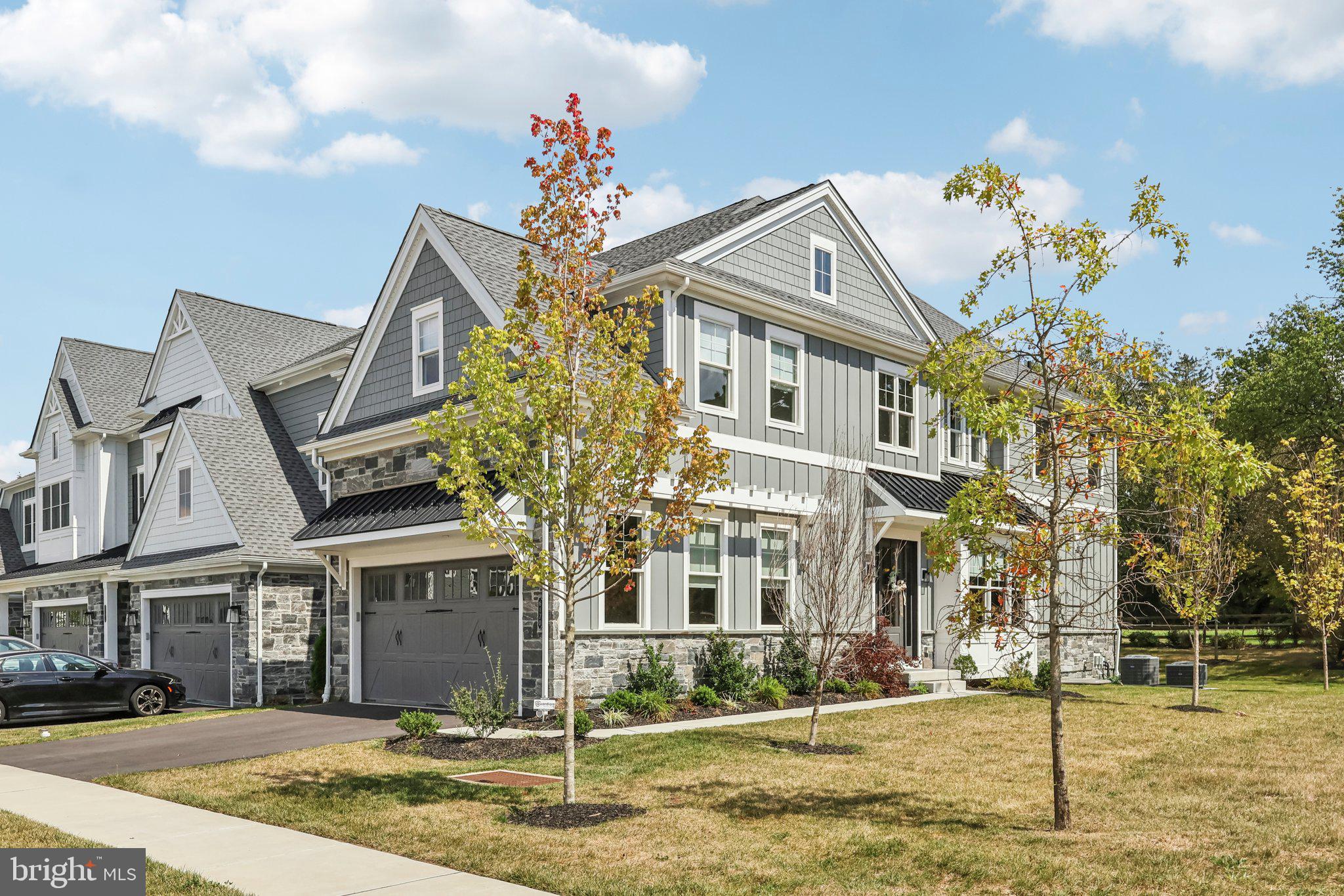 Experience the perfect blend of modern luxury and timeless design at Ironstone at Blue Bell.  Welcome to 6170 Argos Dr, situated on one of the best lots in this exclusive community by award-winning Foxlane Homes. This newly built residence showcases exceptional craftsmanship, high-end finishes, and thoughtful upgrades throughout. This stunning end unit home sits next to community open space and backs up to an 84 acre property offering one of the most serene settings you can find. Over $100,000 spent by the owner on post closing designer finish upgrades throughout the home.  ​

​​A grand two-story foyer greets you with wide-plank hardwood floors, custom millwork, and an elegant chandelier that sets the stage for the home’s elevated style. To the right, a sunlit dining room with a charming window seat offers the perfect setting for gatherings, complemented by a walk-in pantry. The chef’s kitchen is a true centerpiece, featuring an oversized custom island with seating and an impressive suite of professional appliances: a Wolf range with double ovens, paneled Sub-Zero refrigerator, built-in Miele coffee station, and custom cabinetry with glass-front details. The open concept great room enhances everyday living with a soaring tiled gas fireplace, bespoke built-ins, and sliding glass doors that extend to a private deck overlooking green open space.  A refined den/study with wainscoting and a dry bar with beverage refrigerator and wine storage offers perfect additional space for lounging or a home office. Additional conveniences on this level include a spacious laundry/utility room, powder room, oversized storage closet, and interior access to the two-car garage.

Upstairs, the primary suite serves as a private sanctuary with vaulted ceilings, a tailored walk-in closet with custom organization and washer/dryer, and a spa-like marble bath with dual vanities, a glass-enclosed shower, and private water closet. Two additional en-suite bedrooms, each with walk-in closets and upgraded baths, provide comfort and privacy. The finished lower level offers remarkable versatility, with a large recreation room (prepped for a wet bar) and a walk-in wine storage room. Around the corner is a second finished space that would make a perfect guest suite with full bath, ideal for overnight visitors or multi-generational living.

This home is set in a prime Blue Bell location just minutes from area highways and train stations.  Walk across the street to Phil's Tavern or one of the many trails offered by Wissahickon Valley Watershed Association. This home delivers unparalleled style, convenience, and livability in one of the region’s most sought-after communities. No reason to wait for new construction when you can move right into this refined home.