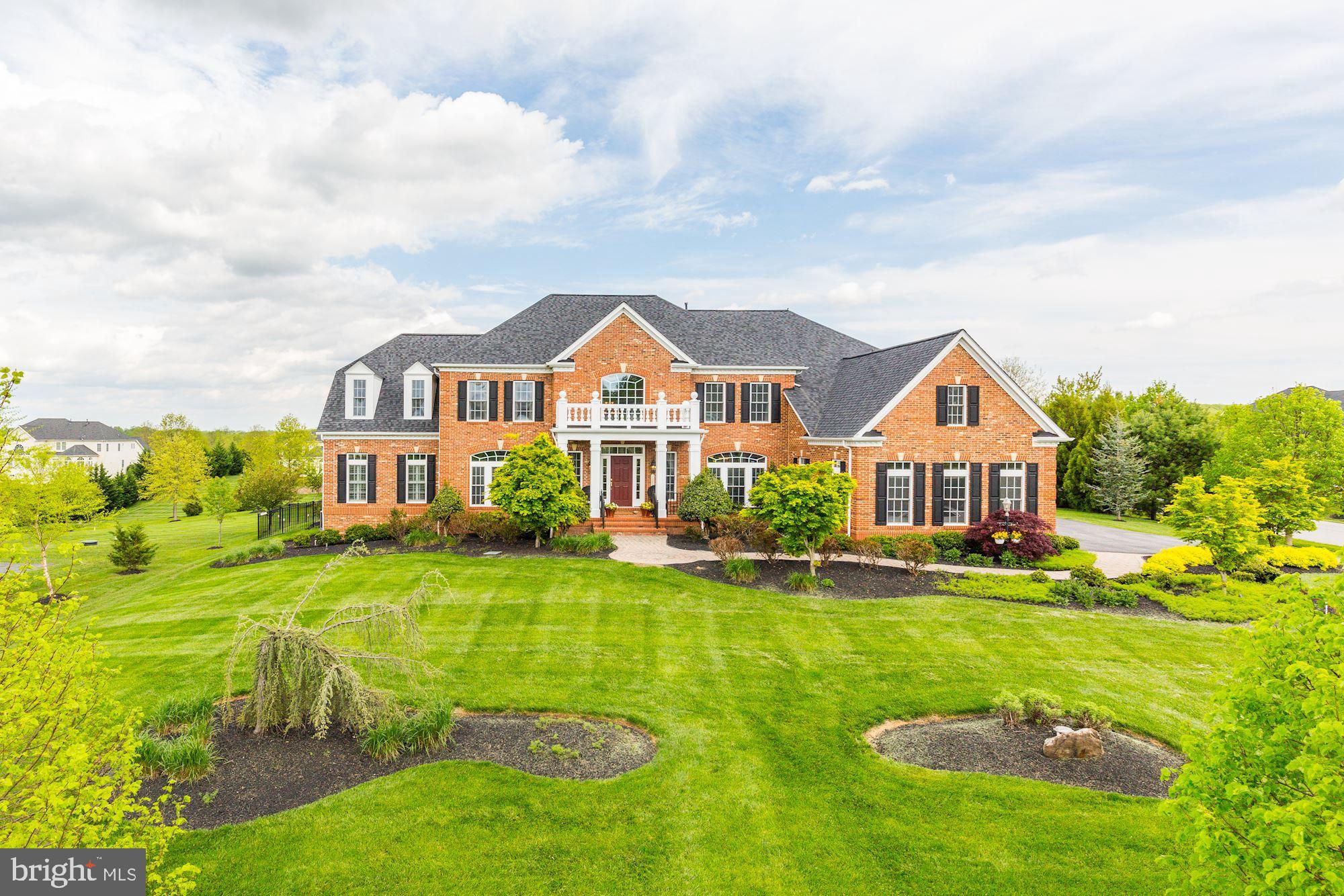 Customized luxury, stunning architecture, showcasing classic and modern design and unparalleled craftsmanship are on display in this one of a kind estate in Clarksville's highly desirable and much sought after Macbeth Farm community. Outside is breathtakingly spectacular. Inside you will find the most intricate and lavish details.   * 6 Bedrooms * 6 Full Baths * Side Sunroom * Breakfast Room *. Expansive Professional Kitchen * Custom Window Treatments * Dance Floor * Custom Bar * Home Theatre * Temperature Controlled Wine Cellar * Cedar Closet * Coffered Ceiling * Palladian Window * Main & Upper laundry * Pavilion * Manicured Lawns