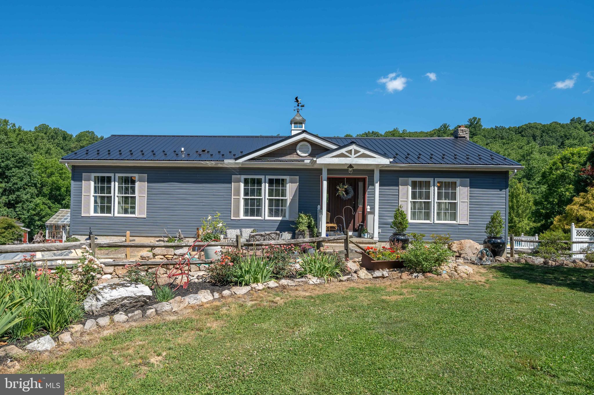 This property is going to onsite auction 7/25/2026 at 12:00 PM. FINAL SALES PRICE WHICH WILL BE BY SELLER CONFIRMATION DAY OF AUCTION. Terms: Down payment of $20,000 required day of auction. Settlement on or before 9/25/2026. Transfer taxes to be paid by buyer. Real Estate taxes shall be prorated......

Set on 1.63 acres, this well-maintained 3,372 sq. ft. ranch home offers space, flexibility, and a variety of potential uses. The home features 4 bedrooms and 3 full baths, with tasteful décor and comfortable living areas throughout.

A spacious great room with a fireplace serves as the heart of the home and opens directly to the outdoor entertaining area, where you'll find an above-ground pool with surrounding deck space for summer enjoyment. Outside, a fish pond is in place and ready for water and the finishing touches to create a relaxing retreat.

The finished lower level includes an in-law suite that is well suited for extended family, guests, or potential rental income opportunities. A two-car attached garage has been utilized for a variety of purposes and provides additional flexibility for hobbies, storage, or workspace needs.

Whether you're looking for room for extended family, income potential, or simply a property with space to enjoy both indoors and out, this home offers a unique opportunity. Conveniently located less than 40 minutes from both Carlisle and Harrisburg, you'll enjoy the convenience of nearby employment, services, and amenities while returning home each day to a peaceful country setting.