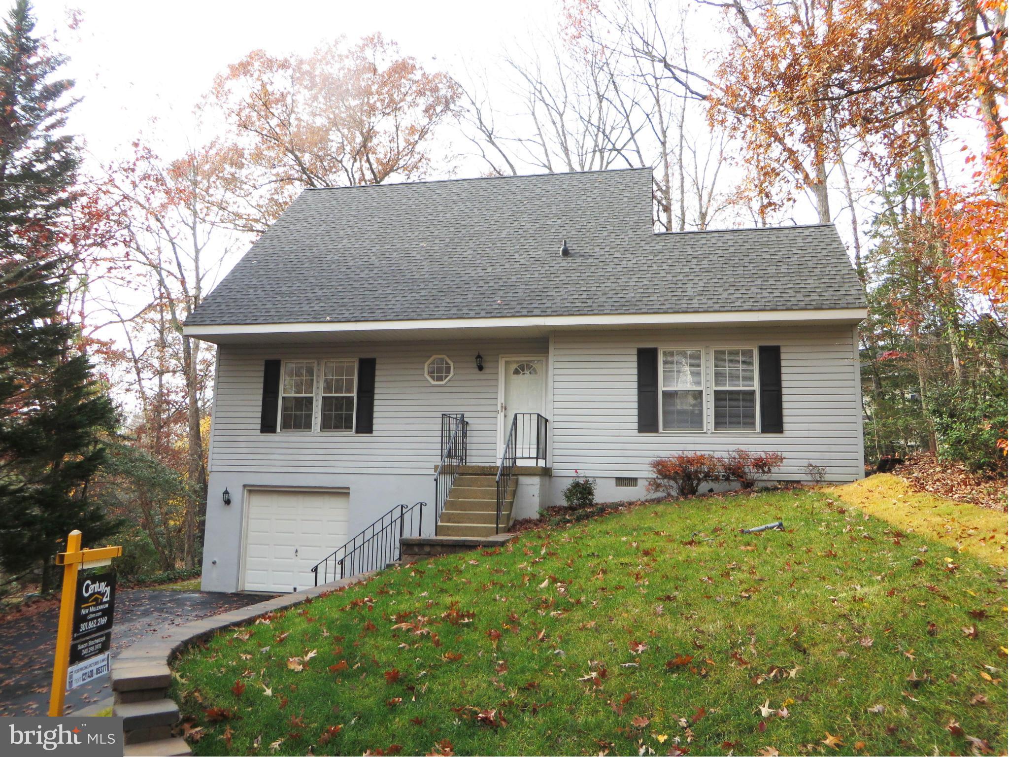 Lovely Wildewood rental has gorgeous hardwood floors! Available now, long-term possible. Main level: living & dining space, kitchen w/pantry, bedroom w/walk-in closet, full bath. Upper: two BRs, one w/extra alcove for play or computer space, full bath. Lower level: laundry room & extended garage w/storage/workshop space. Pool/tennis membership available; no pets or smokers. LAWN CARE INC IN RENT!