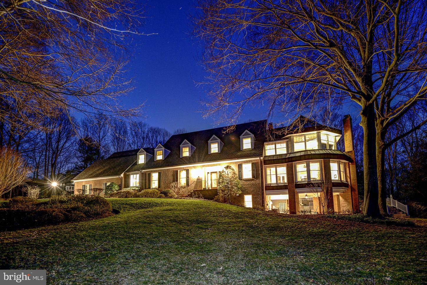 This Potomac estate offers extraordinary living on over 2 acres with pool and private wooded views offering a retreat-like feel! Wonderfully renovated 7000+ sq foot custom home w/gourmet kitchen, large family and living rooms,window-wrapped great room,6 Bedrooms including breathtaking Master Suite,and lower level Au Pair/In Law suite. 3 car garage, perfect indoor and outdoor entertaining spaces!