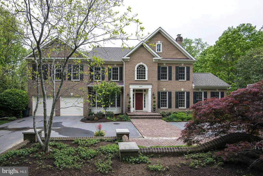 Unique opportunity to live in Bethesda in a quiet enclave off Bradley Blvd. Home was extensively renovated in 2010-11 including new roof, skylights, energy efficient HVAC, hardwoods, recessed lighting, garage doors & openers, gourmet kitchen with ss appliances & new granite & large wraparound deck with wrought iron railing. Lots of extra space with w/o lower level and third level suite.