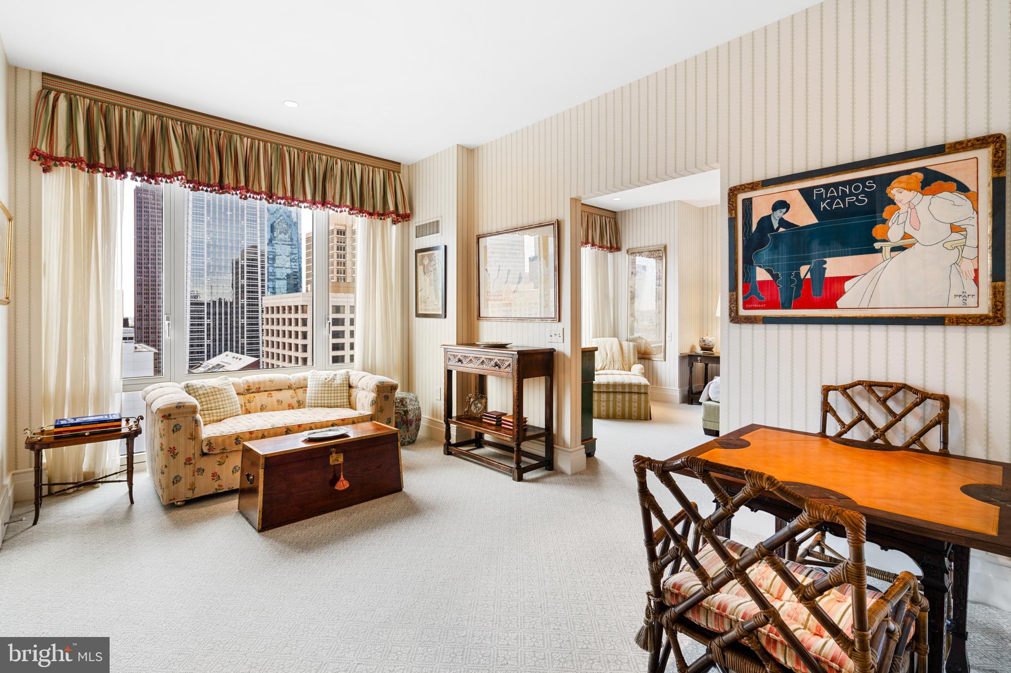 Welcome to residence 2402, a high floor 1 bed, office PLUS sitting room, 2.5 bath condo. 1 parking license included.