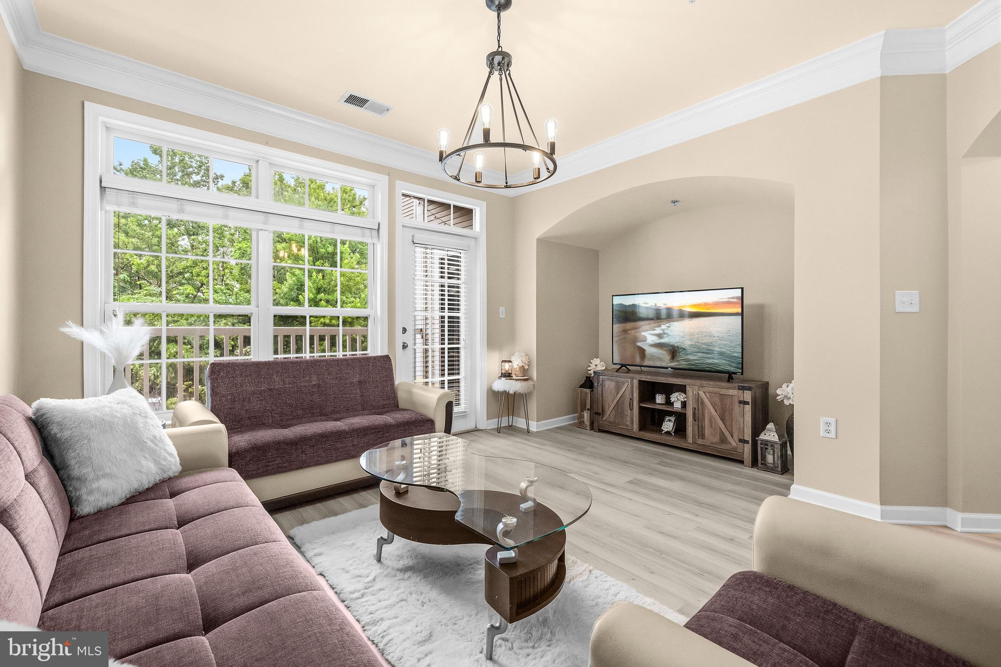 This stunning condo is located in the popular gated community of Stratford Club in The Town of Leesburg. Upon entrance you are greeted by the inviting foyer and open, sunlit floorplan. Tons of tasteful updates throughout including Desirable built-in shelving, neutral paint palette, wood trim accents, and upgraded flooring and lighting. The spacious living room offers lots of natural light. The kitchen is a dream, with sparkling granite counters, tile backsplash, large pantry and breakfast bar.  Large Primary suite with large walk in closet, ceiling fans with lights, and a full bathroom bathroom with dual vanities and sinks, and a separate laundry room with full size washer and dryer! Step out onto balcony from your living room or bedroom and enjoy private treed views   Location is everything: Stratford Club offers wonderful community amenities (pool, fitness room, clubhouse, etc..), and is convenient to major commuter routes, the Toll rd and Route 7. Close proximity to Town of Leesburg: tons of shopping, dining, shopping, recreation centers, public library, WO&D Trail and more!  Must see!