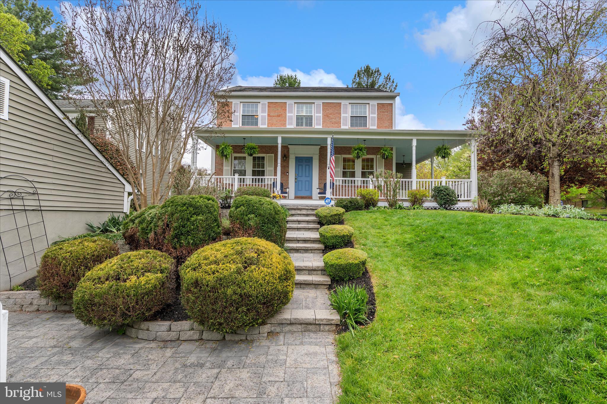Back on the market, no fault of the Seller.  Inspections were clean and appraisal was completed with value over the current asking price!  Welcome to 12135 Little Patuxent Parkway, perfectly set on a beautifully landscaped lot just under 1/3 acre in the heart of Columbia. From the moment you arrive, the wraparound front porch and mature landscaping create a warm, inviting first impression, while the detached garage adds both convenience and charm.

Inside, hardwood floors carry throughout the main level.  The welcoming foyer is complete with a built-in storage system to keep everyday living organized. A conveniently located powder room sits just off the entry. The spacious living room features custom built-in bookshelves and a wood-burning fireplace that anchors the space with character.  

The kitchen is beautifully designed, offering a center island, built-in pantry, stainless appliances, granite counters and seamless connection to an additional dining area (or additionalliving area), and adjacent to the formal dining room.   Step out onto the expansive deck overlooking the beautifully landscaped backyard, complete with a zoned sprinkler system.  All of the main level rooms have custom plantation shutters.  

Upstairs, you’ll find three generously sized bedrooms, a large primary suite with dual closets including a walk-in closet and a private bath featuring a dual sink vanity. The hall bathroom is equally spacious with double sinks, and all bathrooms throughout the home have been thoughtfully updated with quality finishes.

The finished lower level adds even more versatility with a large recreation room, a fourth bedroom, an adjacent full bathroom, along with a large laundry/utility/storage area.   The rec room walks out to a paver patio that extends beneath the deck, creating a shaded outdoor retreat. An additional storage room, accessed from the patio, provides even more space for your storage, tools, seasonal items, and more!

This home offers plenty of space, and has an inviting layout, all in a prime location with easy access to shopping, dining, and major commuter routes to Fort Meade, D.C., Baltimore, and Annapolis.