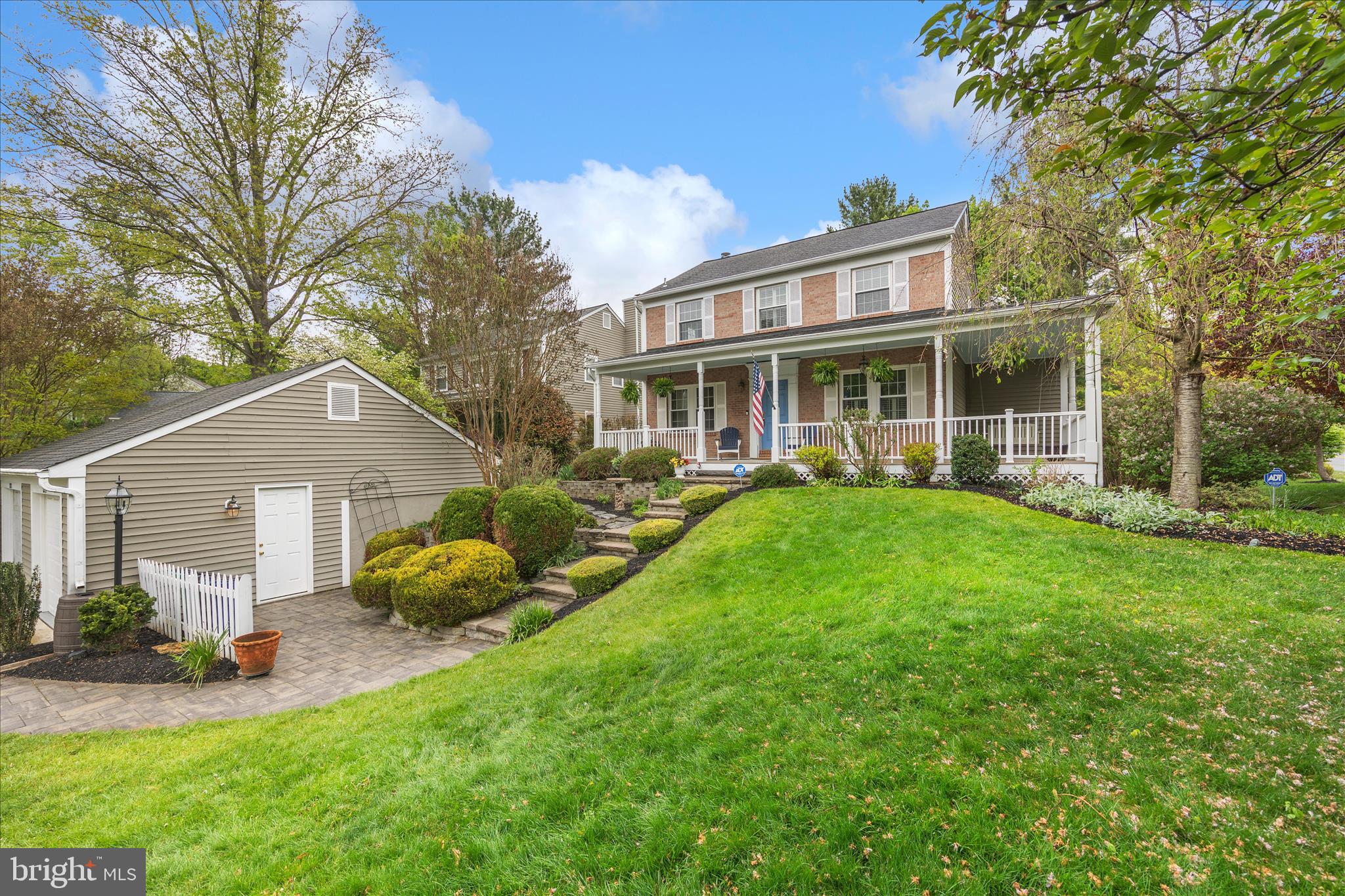 Back on the market, no fault of the Seller.  Inspections were clean and appraisal was completed with value over the current asking price!  Welcome to 12135 Little Patuxent Parkway, perfectly set on a beautifully landscaped lot just under 1/3 acre in the heart of Columbia. From the moment you arrive, the wraparound front porch and mature landscaping create a warm, inviting first impression, while the detached garage adds both convenience and charm.

Inside, hardwood floors carry throughout the main level.  The welcoming foyer is complete with a built-in storage system to keep everyday living organized. A conveniently located powder room sits just off the entry. The spacious living room features custom built-in bookshelves and a wood-burning fireplace that anchors the space with character.  

The kitchen is beautifully designed, offering a center island, built-in pantry, stainless appliances, granite counters and seamless connection to an additional dining area (or additionalliving area), and adjacent to the formal dining room.   Step out onto the expansive deck overlooking the beautifully landscaped backyard, complete with a zoned sprinkler system.  All of the main level rooms have custom plantation shutters.  

Upstairs, you’ll find three generously sized bedrooms, a large primary suite with dual closets including a walk-in closet and a private bath featuring a dual sink vanity. The hall bathroom is equally spacious with double sinks, and all bathrooms throughout the home have been thoughtfully updated with quality finishes.

The finished lower level adds even more versatility with a large recreation room, a fourth bedroom, an adjacent full bathroom, along with a large laundry/utility/storage area.   The rec room walks out to a paver patio that extends beneath the deck, creating a shaded outdoor retreat. An additional storage room, accessed from the patio, provides even more space for your storage, tools, seasonal items, and more!

This home offers plenty of space, and has an inviting layout, all in a prime location with easy access to shopping, dining, and major commuter routes to Fort Meade, D.C., Baltimore, and Annapolis.